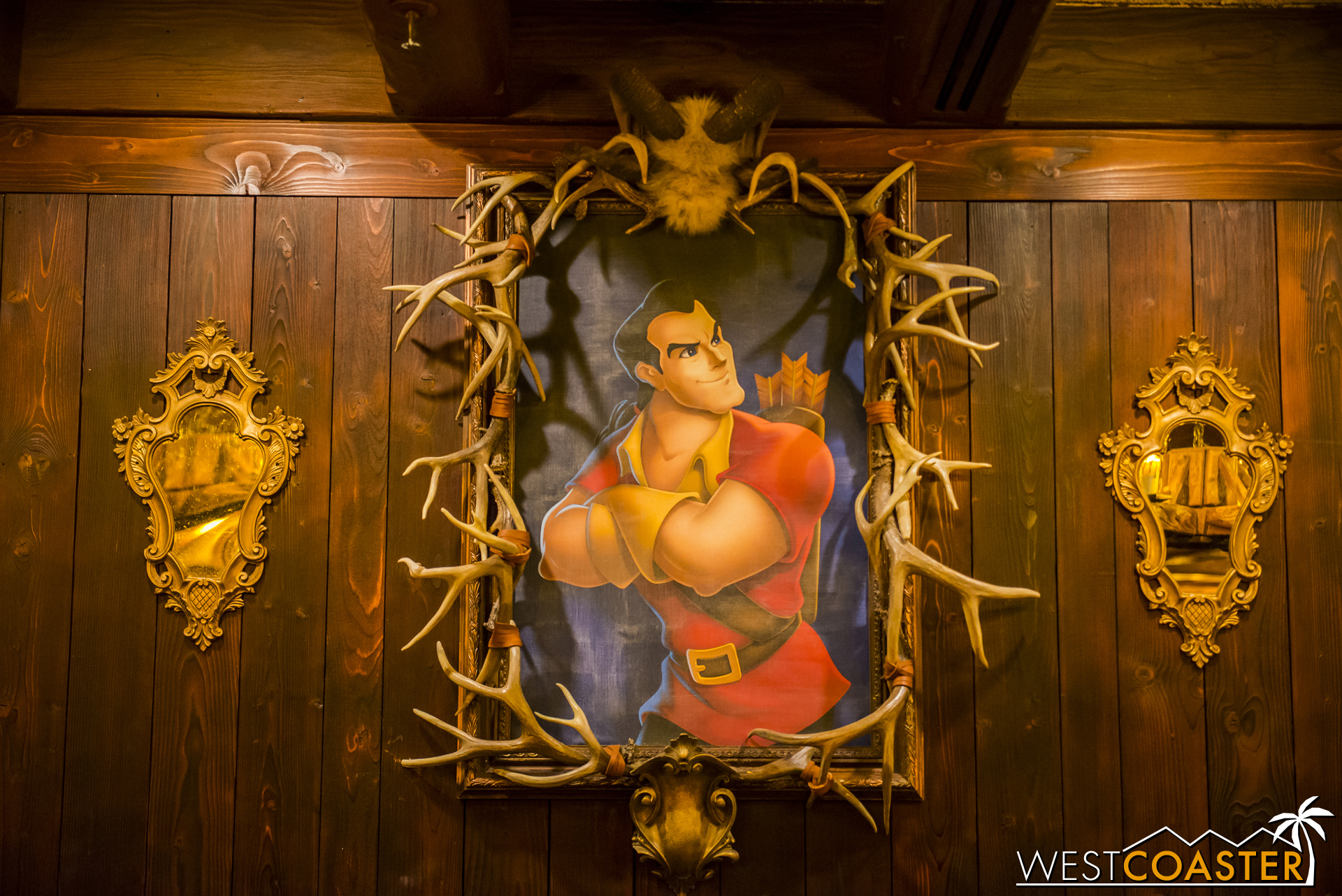  Gaston's presence is in full effect as a framed drawn portrait on one wall. 