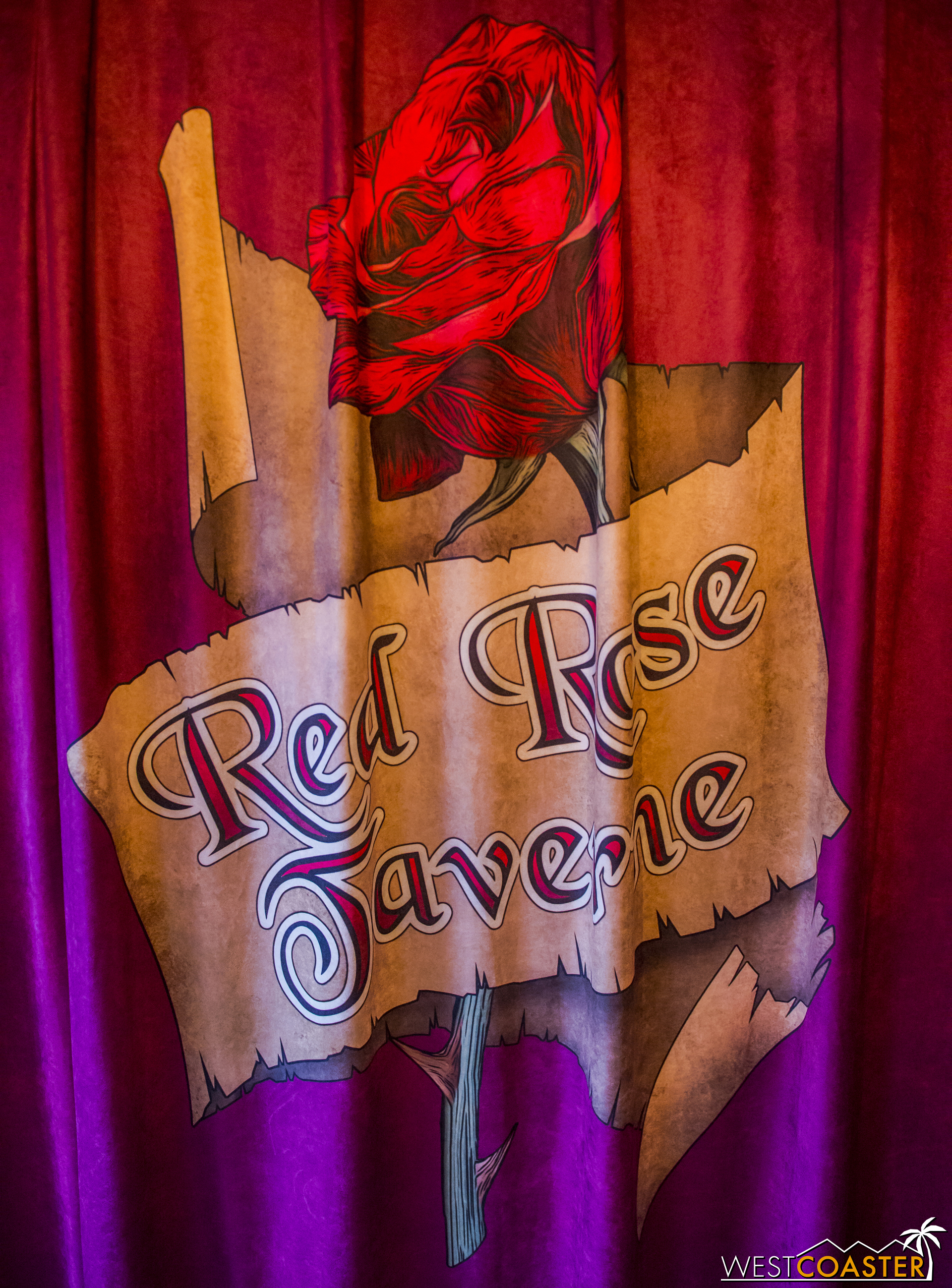  Entering the building, curtains with the Red Rose Taverne logo drape both sides, covering up the regular Pinocchio murals. 