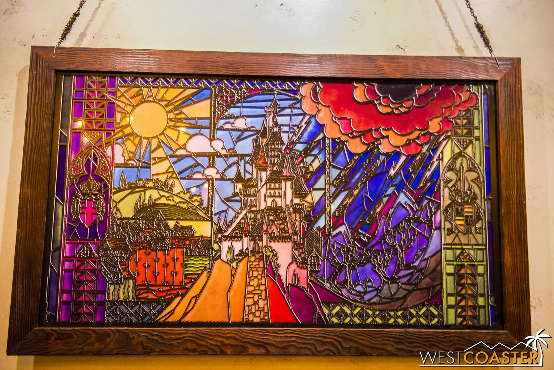 This lovely stained glass piece is on the wall opposite from Gaston's portrait and is gorgeous.