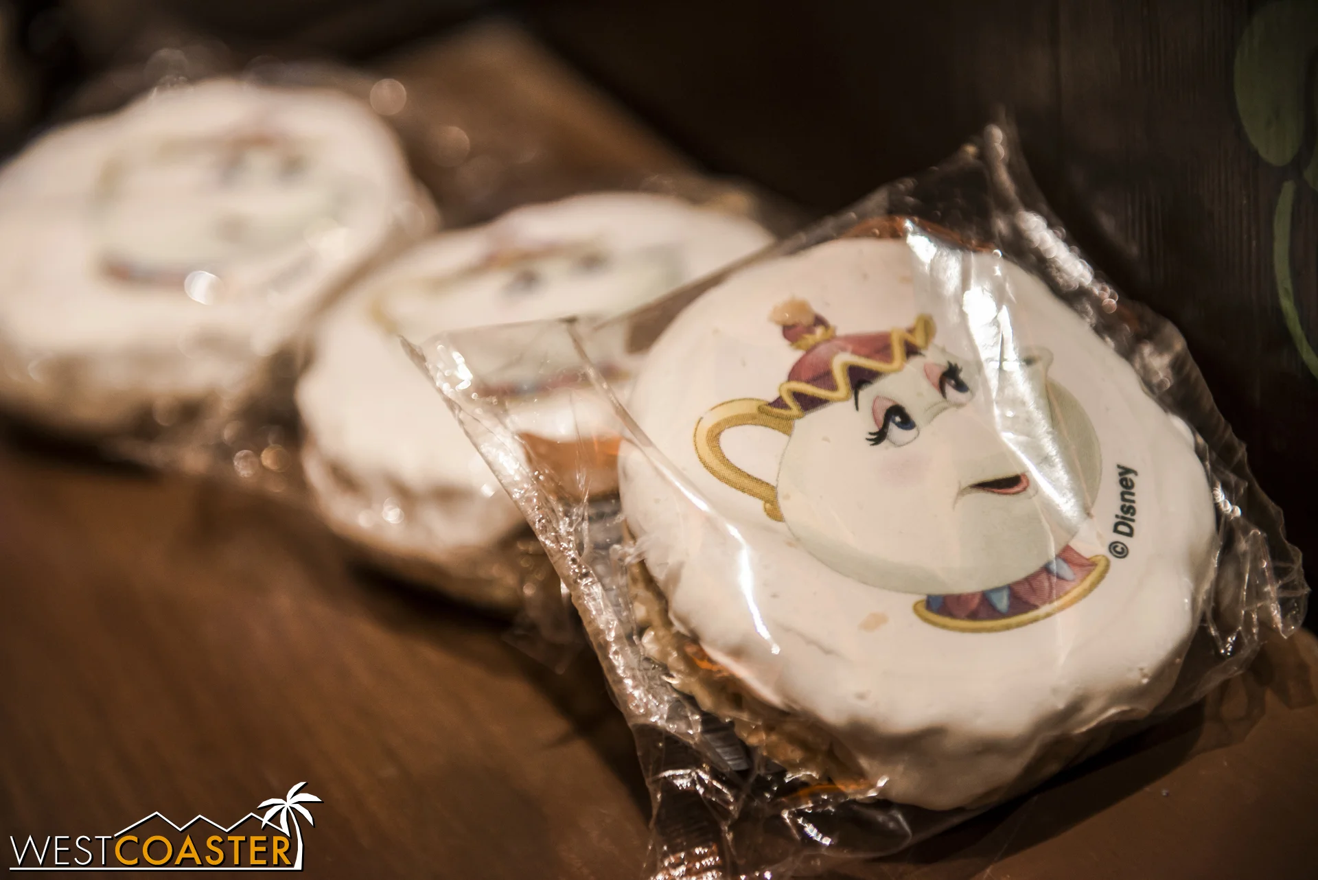 Beauty and the Beast rice crispy treats are offered at the cashier.