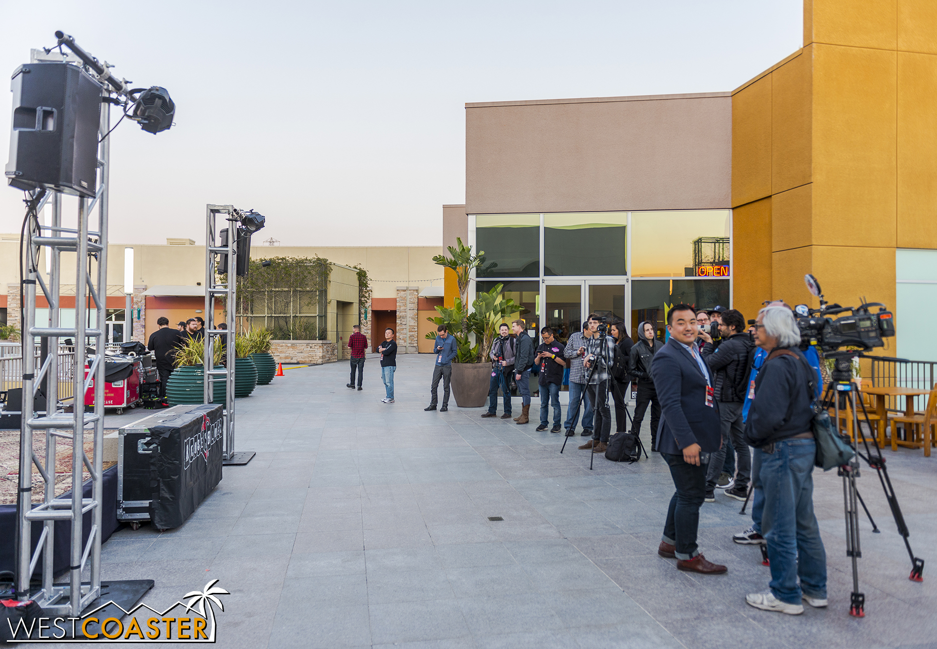 Media members waiting for the grand opening festivities.
