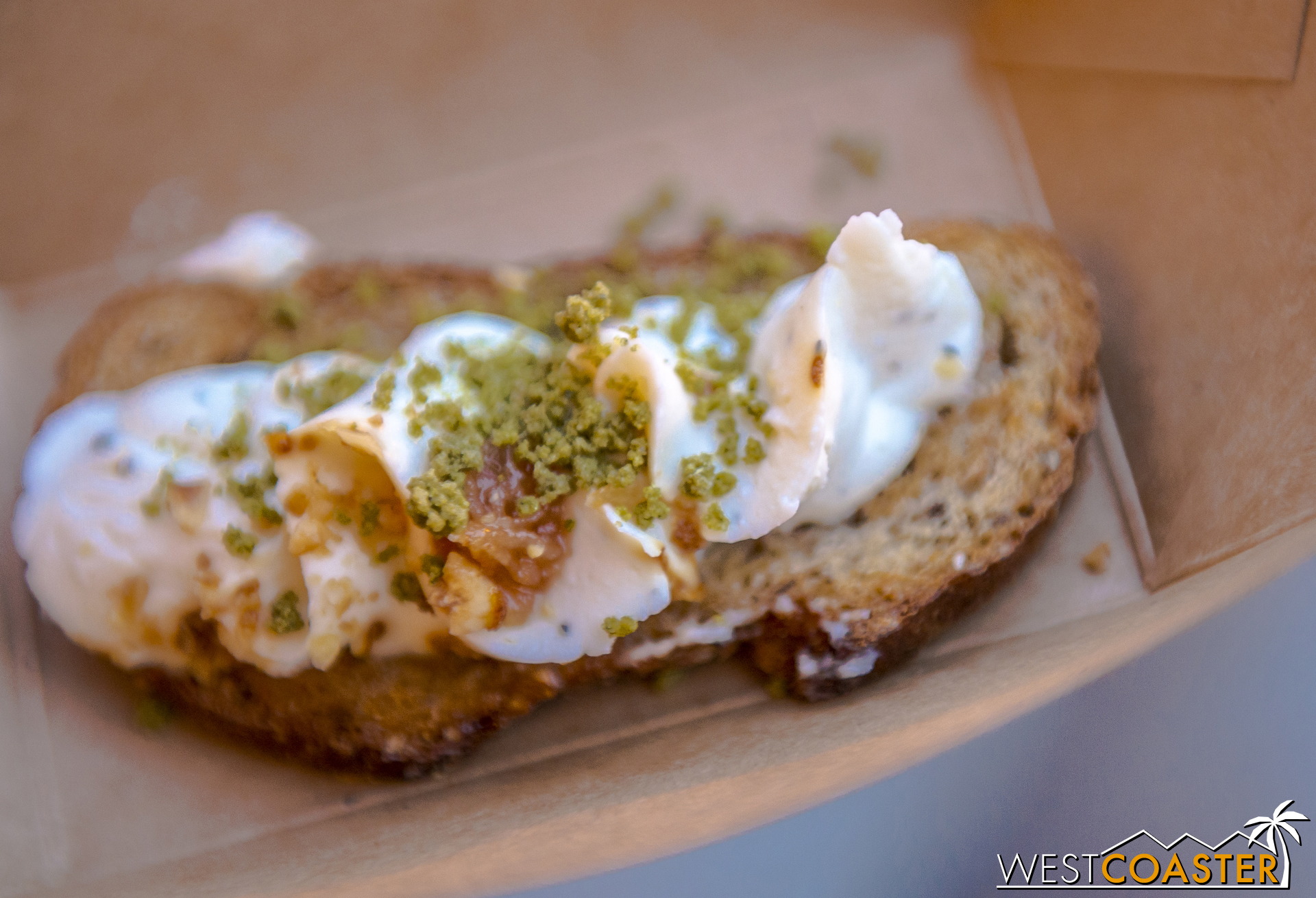  From Nuts About Cheese:  Chèvre Fromage Blanc Tartine  infused with Rosemary and Honey, with Toasted Hazelnuts ($4.50) 