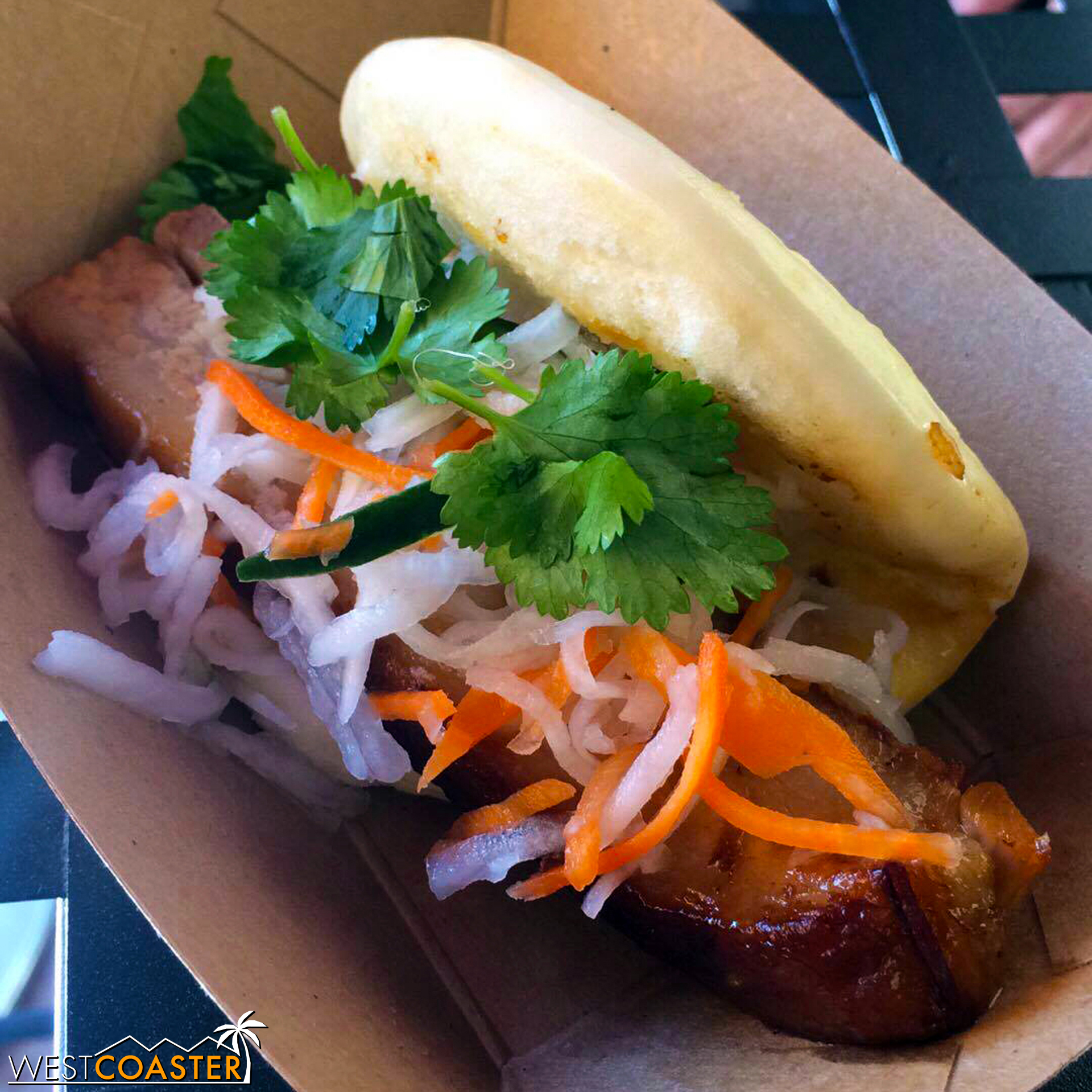  From Garlic Kissed:  Black Garlic and Soy-braised Pork Belly Bao  with Pickled Vegetables ($7.00)  (Photo Credit: Jessica S.) 