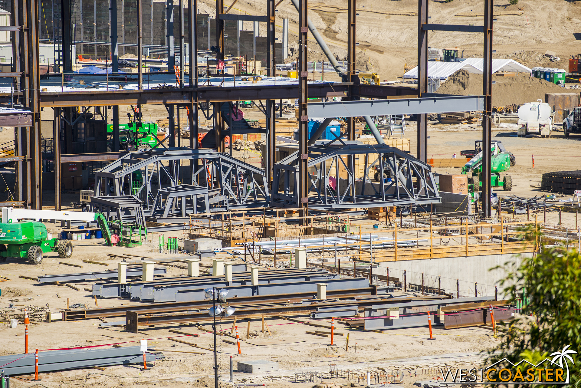  Some trussed bridges have shown up in the middle of the building too.&nbsp; One would almost expect these to be at the Rivers of America for the Disneyland Railroad, but they're here.  EDIT: Aaaaaand, I was trying to be coy, but just go to the comme