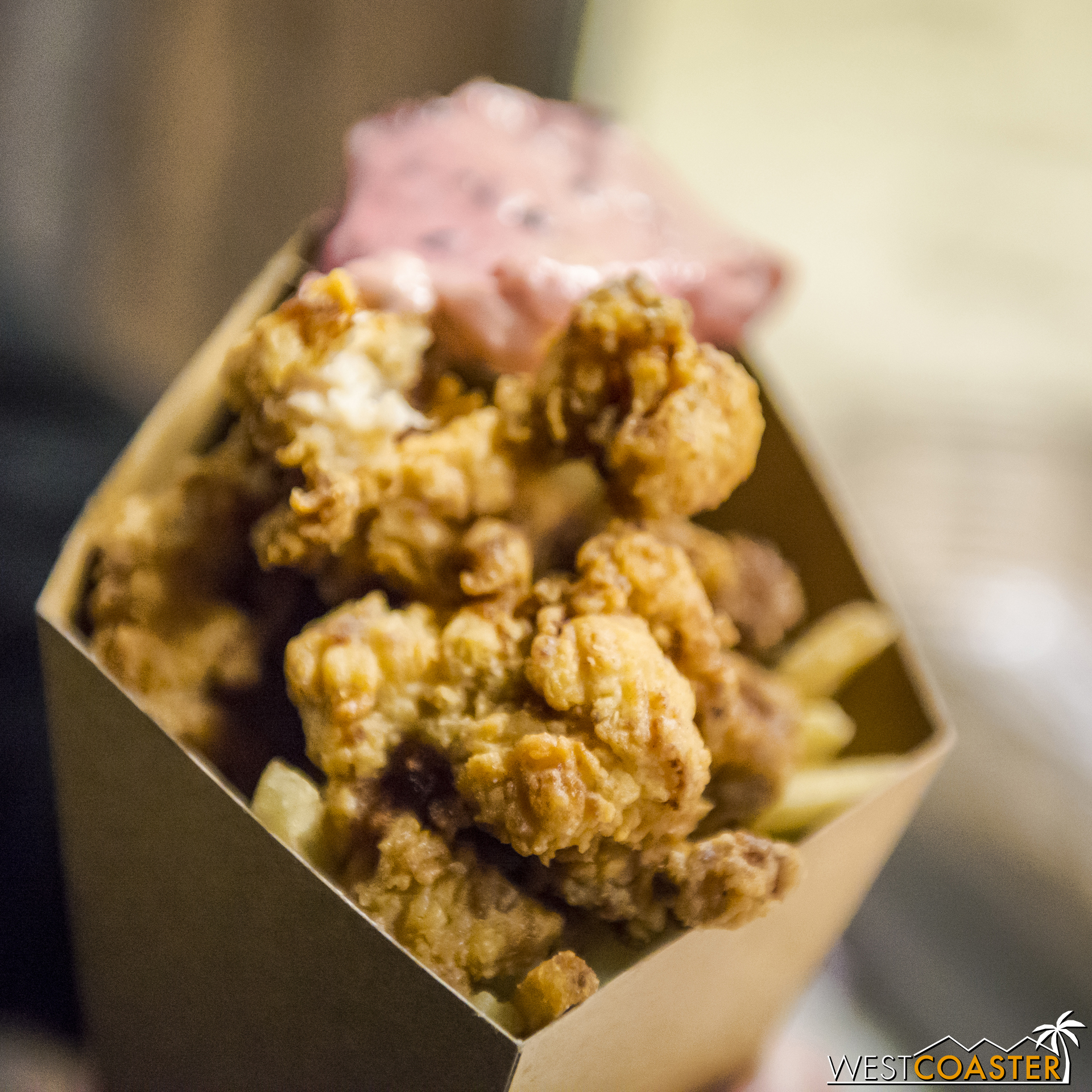  Guests can get the Boysenberry Gator Bites over at the Fry Stand near the front of Ghost Town.&nbsp; It's pretty tasty, if you are brave enough to try it.&nbsp; Truthfully, it tastes like chicken but with a fishy feel to it.&nbsp; That might put som