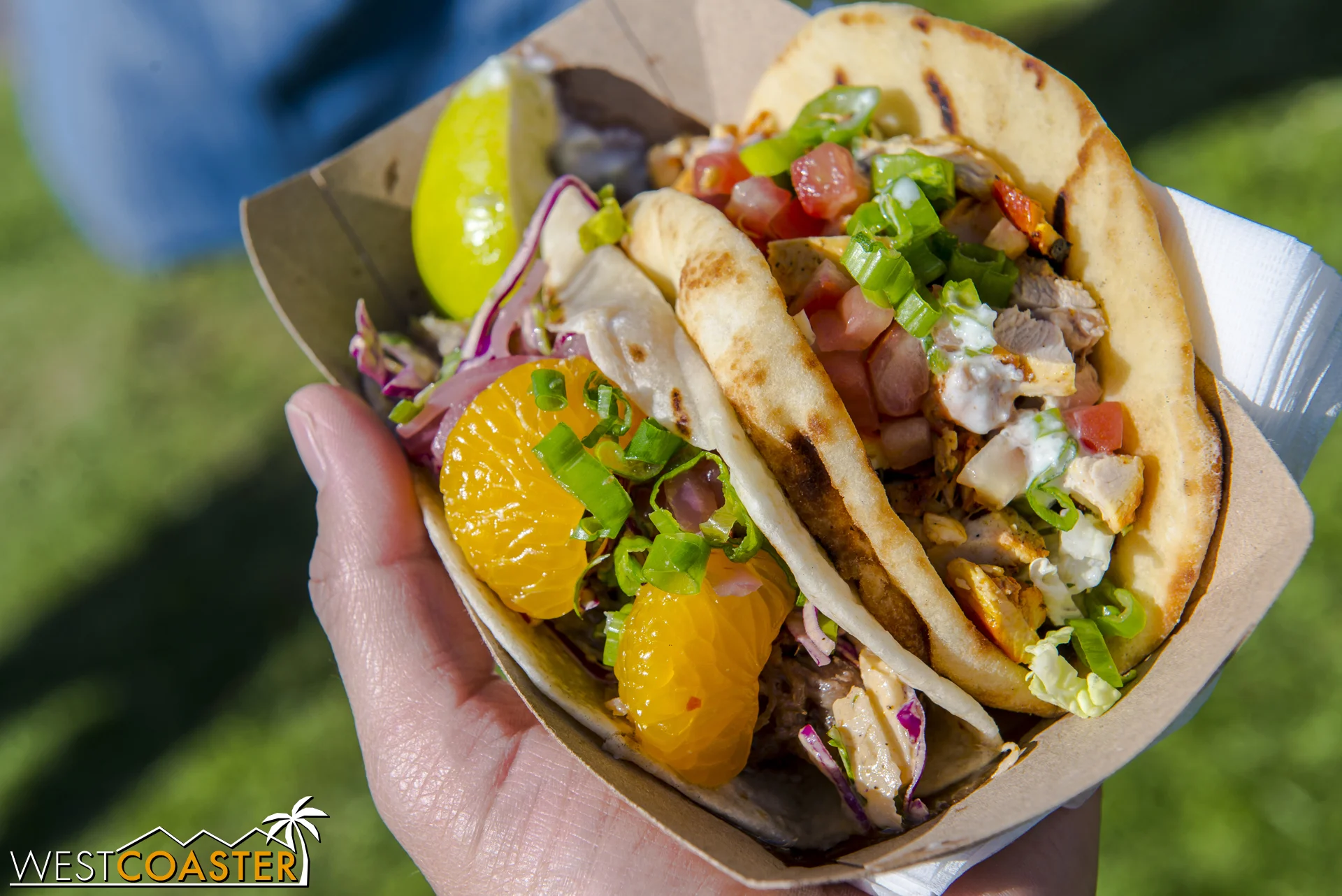 A duck confit taco with mandarin oranges and a garlic chicken taco from Stadium Brewing Company. The duck was exquisite--another top fave.
