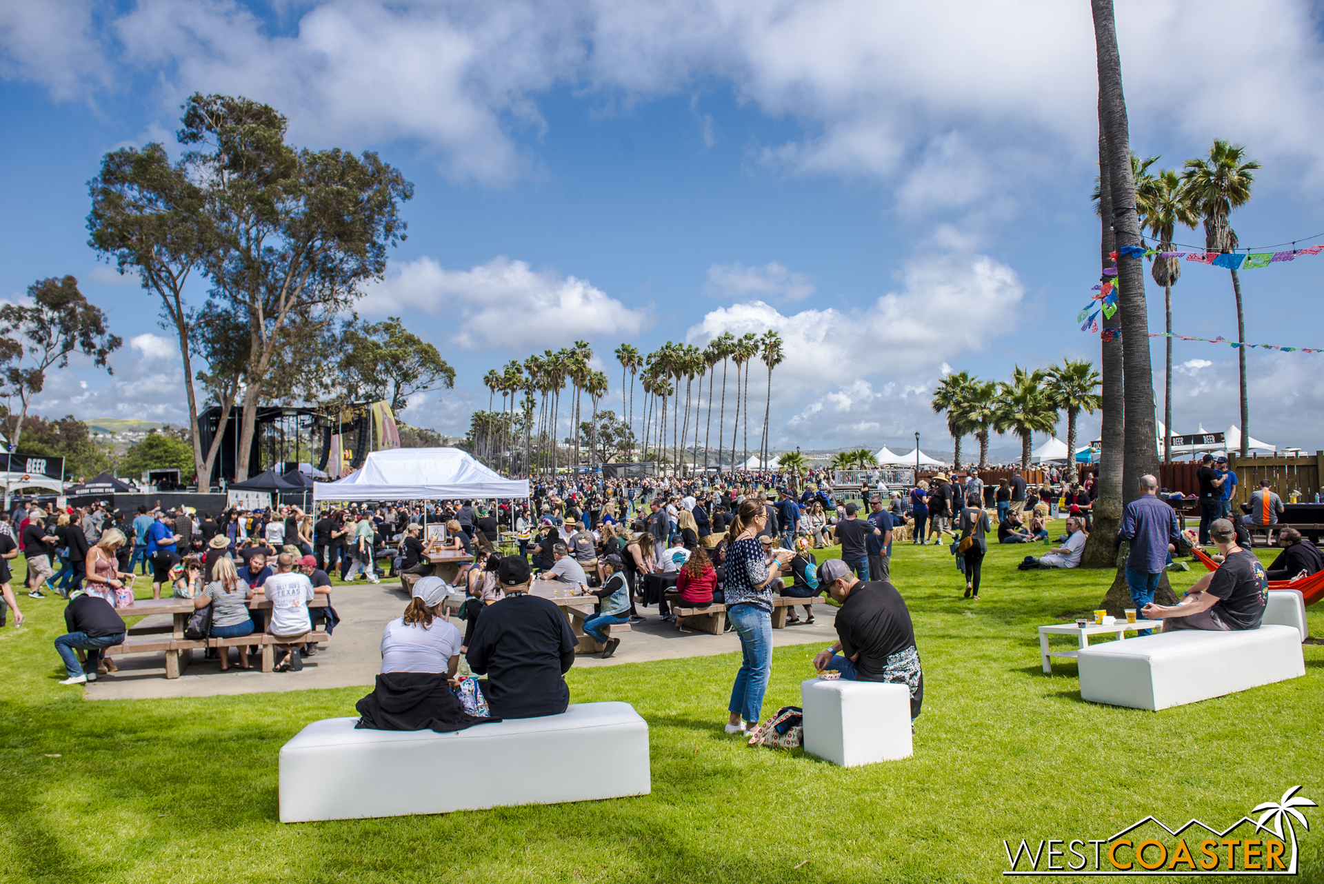  The green and bustling festival grounds. 