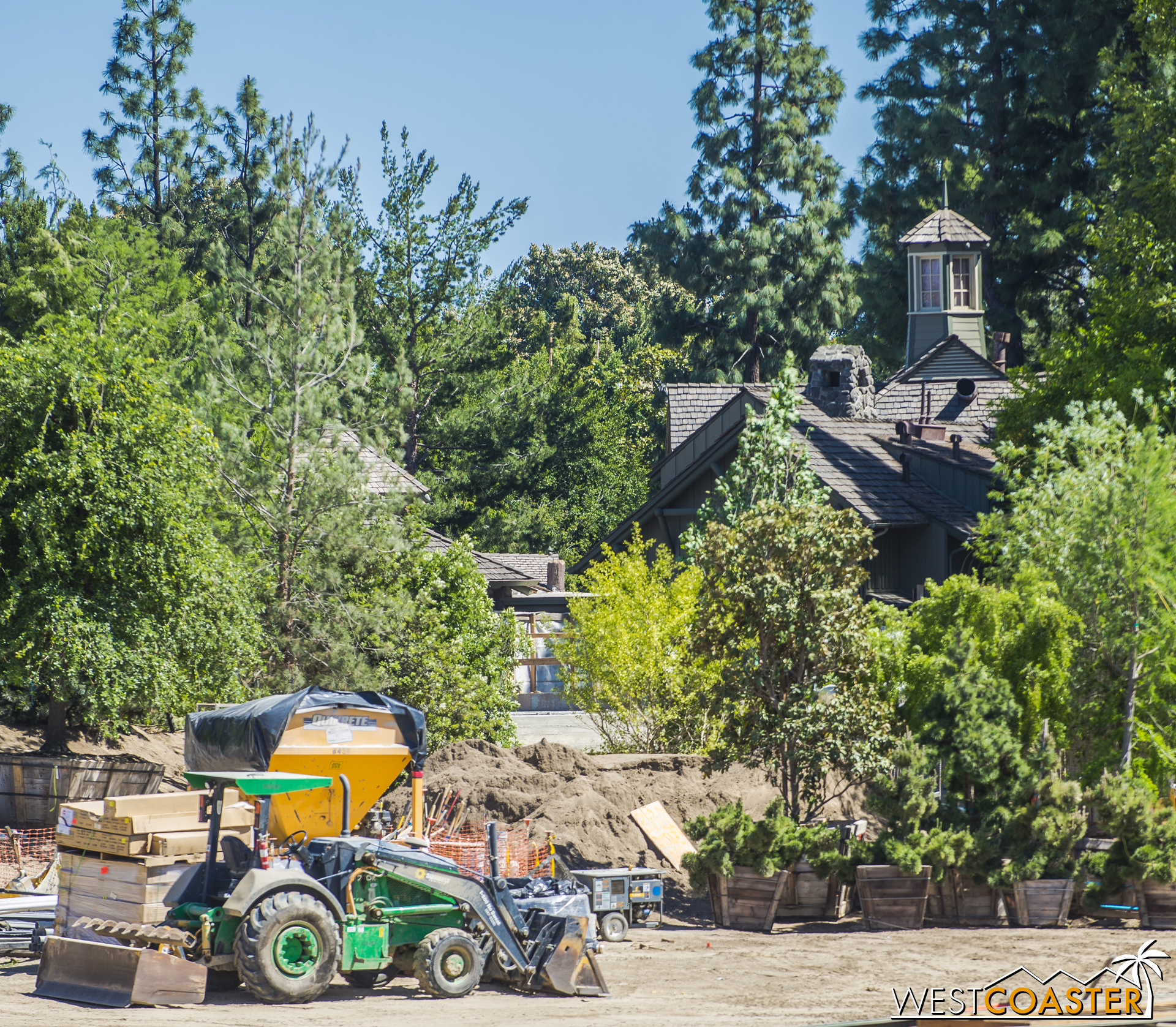  But through the trees, you can see some concrete spanning across where the Disneyland Railroad runs. 