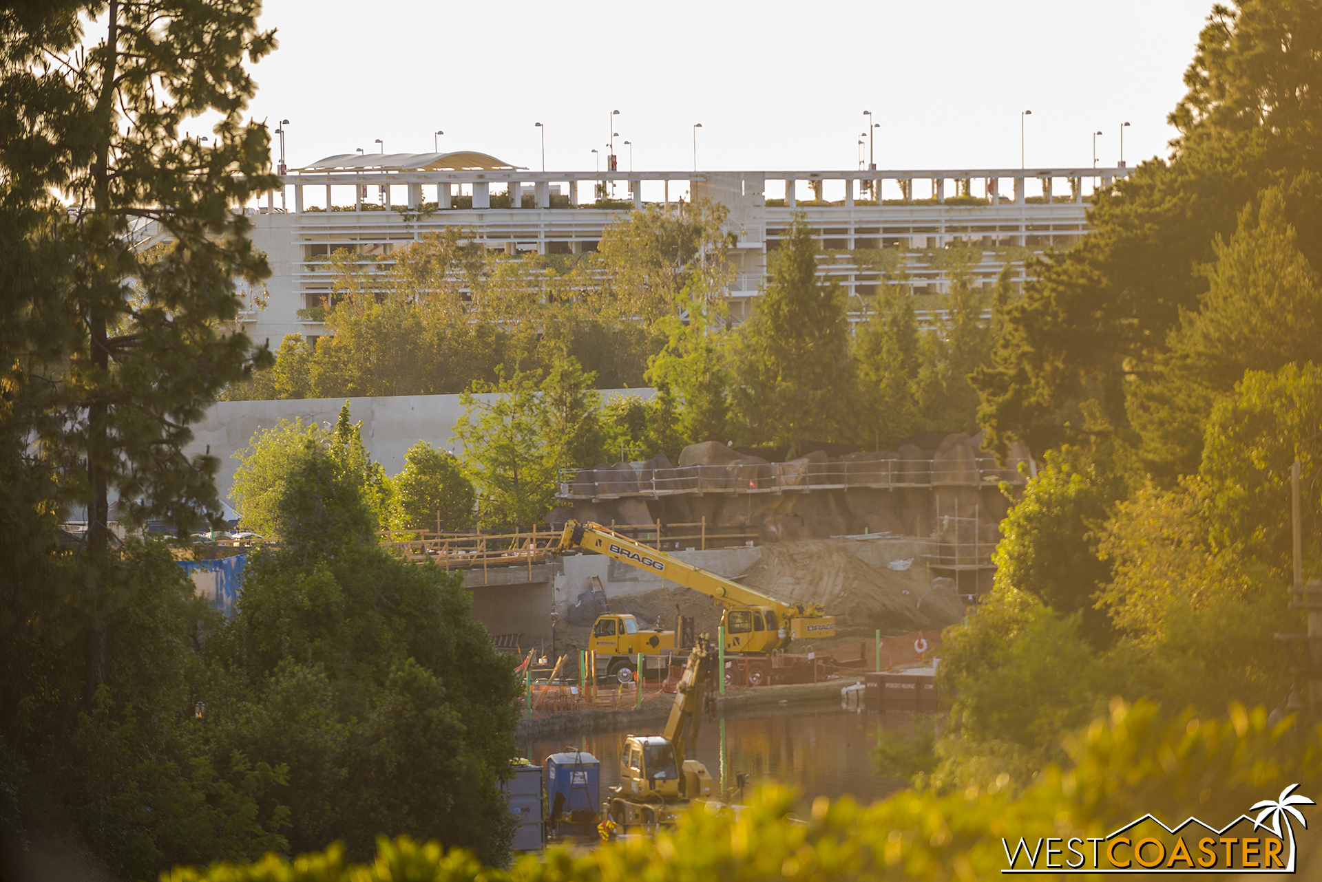  From higher up, we can see construction equipment working on that railroad bridge. 