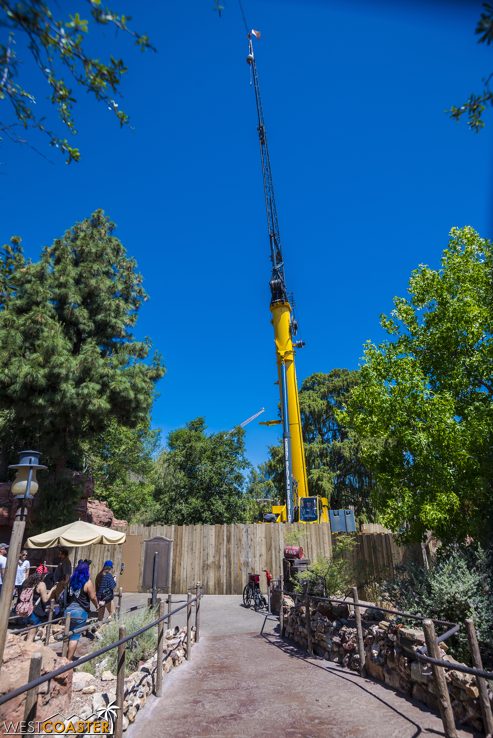  Another crane has appeared at Disneyland, and to prevent public access to this construction equipment, a new work wall is up basically at the end of the Big Thunder Mountain exit. 