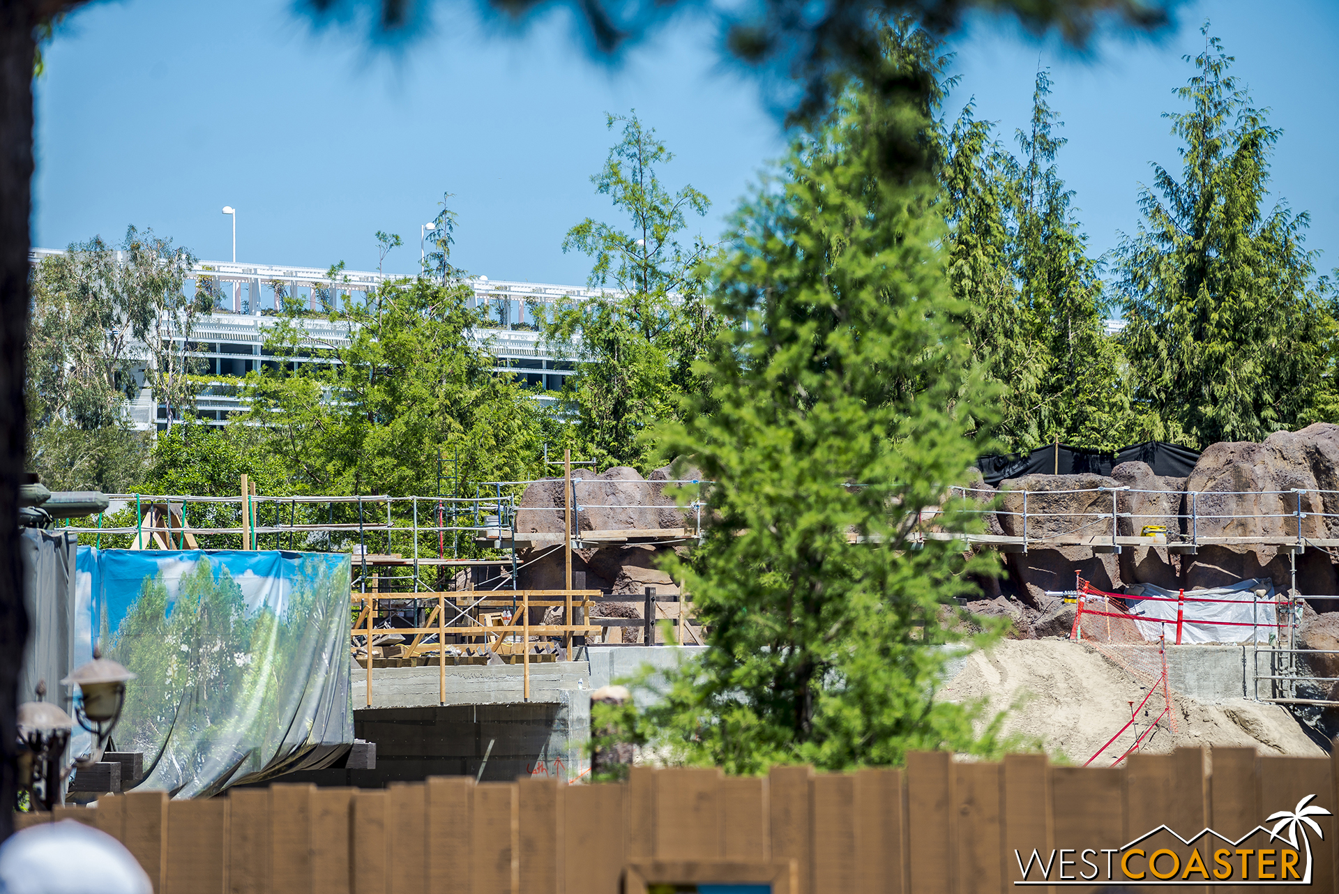  The concrete just beside the tarp on the left is part of the bridge over the tunneled entrance that will lead guests walking along the Rivers of America waterfront beside the Hungry Bear Restaurant into the future "Star Oars" Land. 