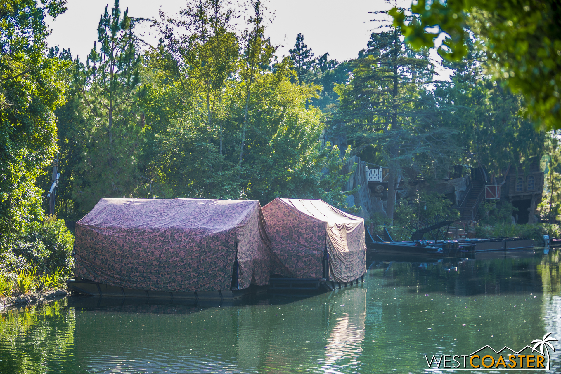  FANTASMIC! barges continue to be hidden by day.&nbsp; Eventually, they'll have their own permanent backstage storage area on the backside of the river, by the new rockwork and waterfall area past Critter Country. 