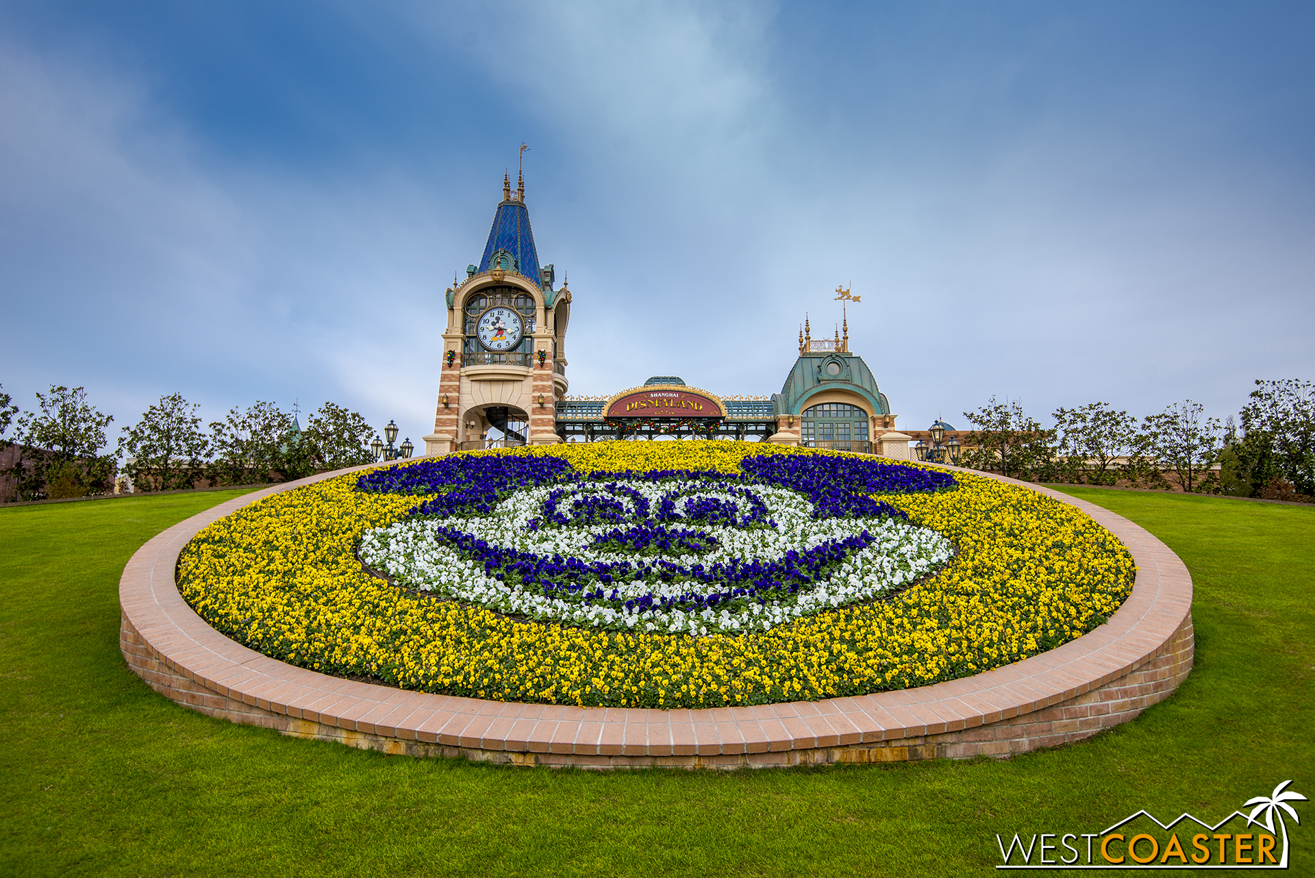 The prerequisite Mickey Mouse floral greets guests into the park.