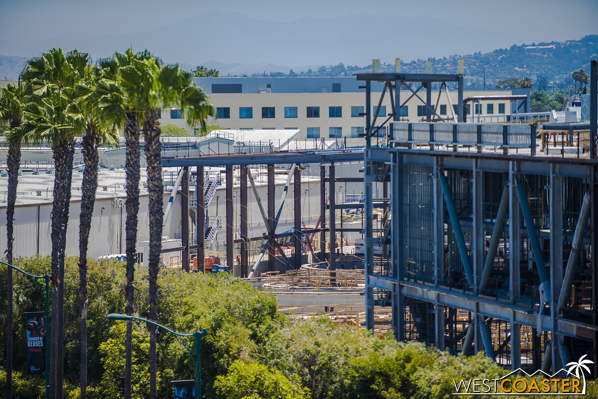  We can still spot the circular concrete forms of each show room side, but notice how high above the roof flies over. 