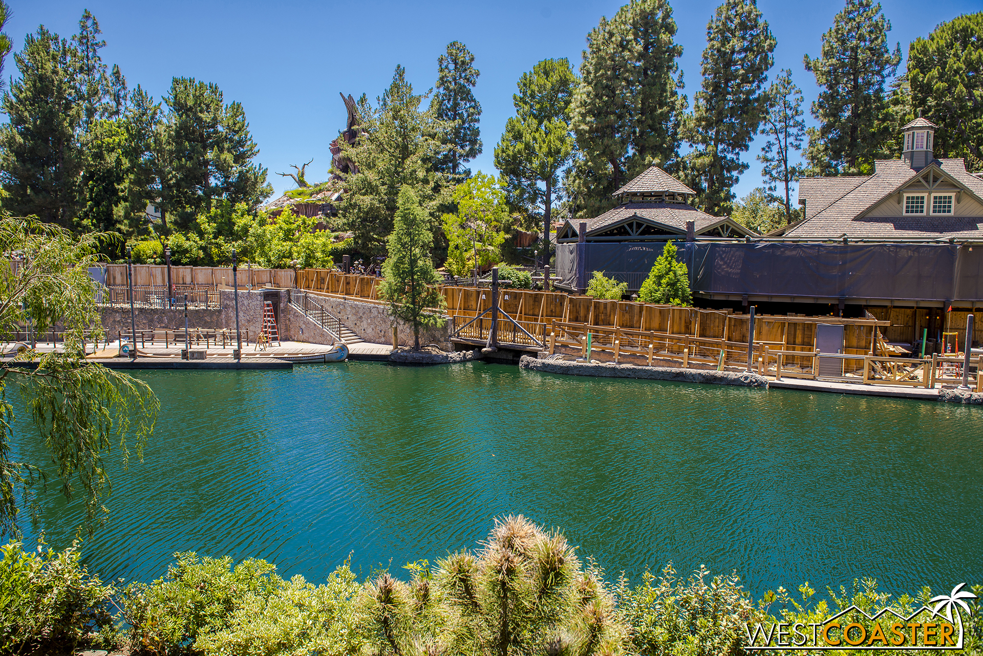  As the trees clear, you can see how this relates to the canoes and the existing ramp to the lower level of the Hungry Bear. 