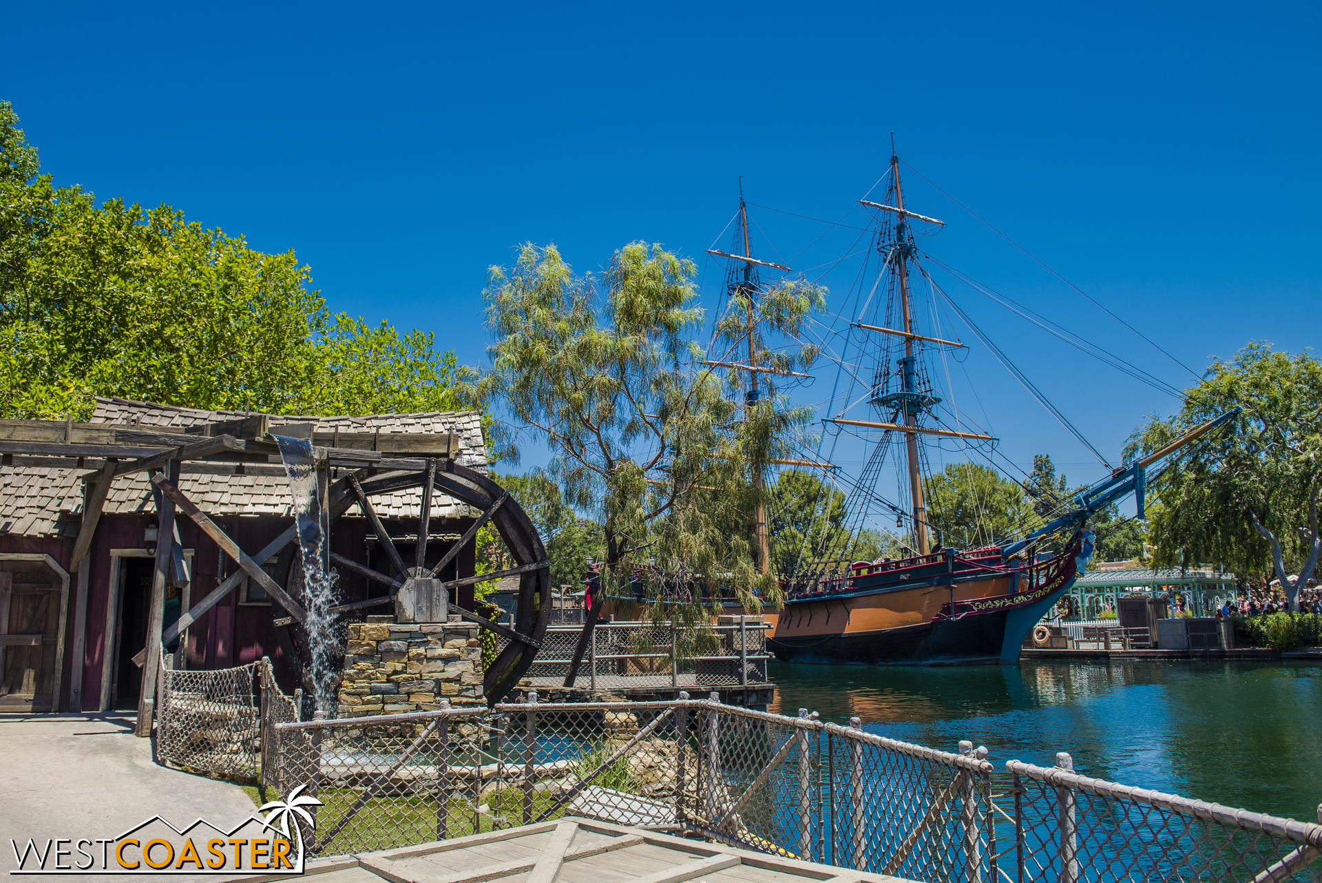  The water wheel is still here, and the Columbia has taken up dock at Frontier Landing on the other side of the water. 