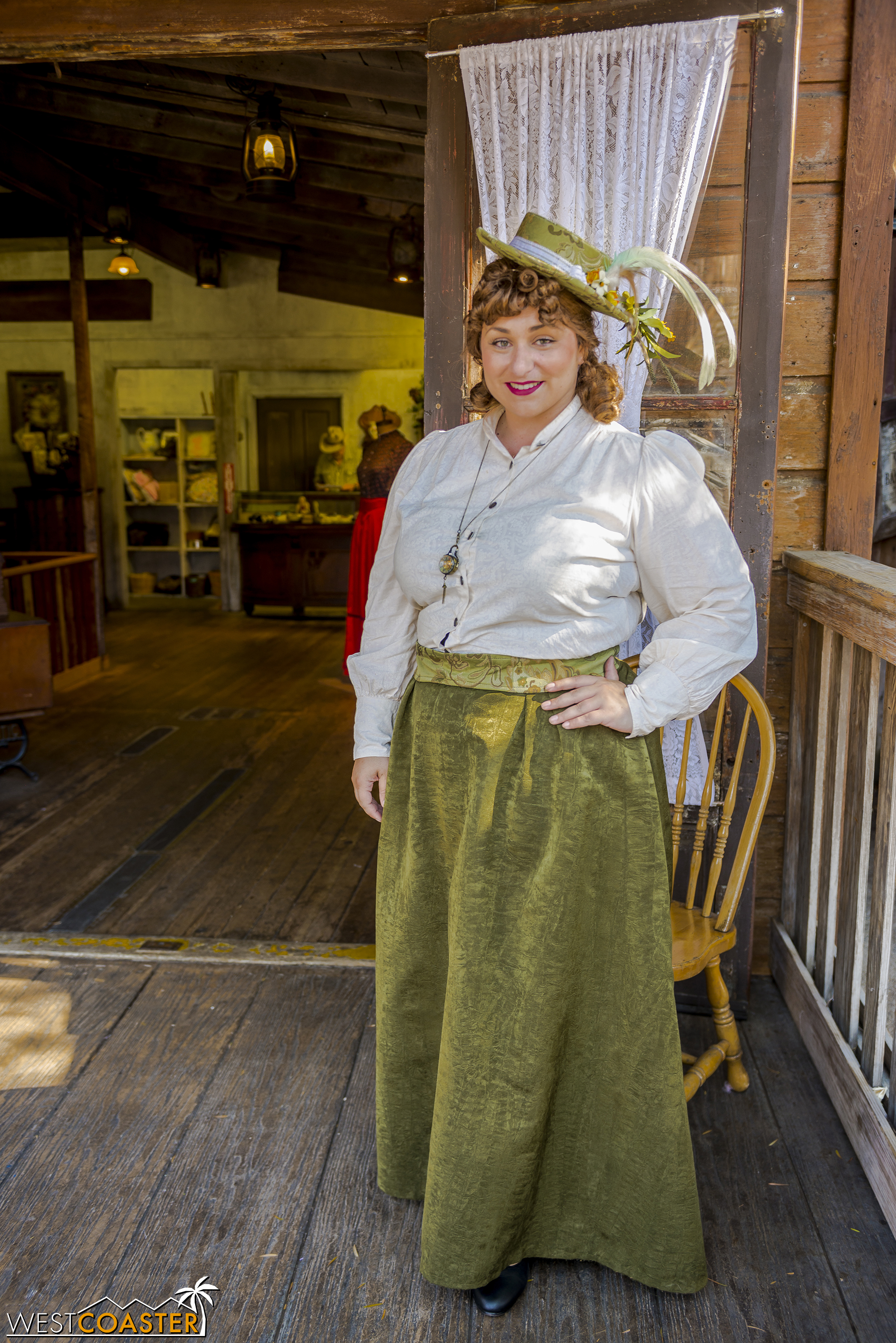  Gertie has hired a new assistant, Frances Parsons, for her dress shop, and she minds the entrance and chats with passers-by. 