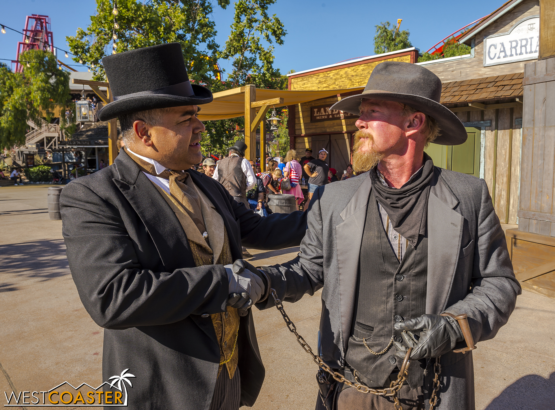  Folks start to gather at Calico Park around 5:30.&nbsp; Here, Mayor Parnell chats with Clay Mayfield.&nbsp; It seems that even though there are villians and heroes, everyone still gets along with each other pretty well. (Plus, Clay ain't so bad this