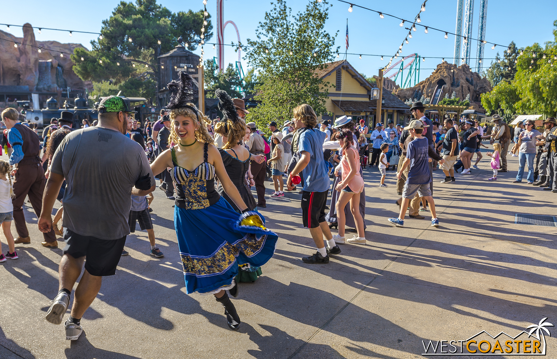  The crowd engages in several line and country dances, taught to them by the Citizens.&nbsp; 