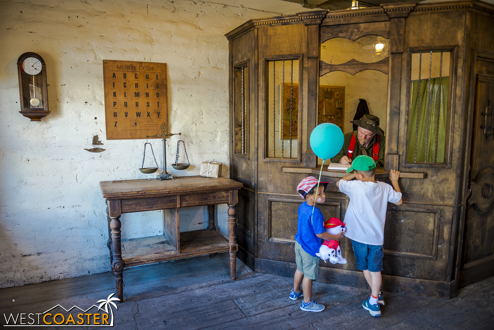  Over at the bank, two young honorary Calico citizens open up an account. 