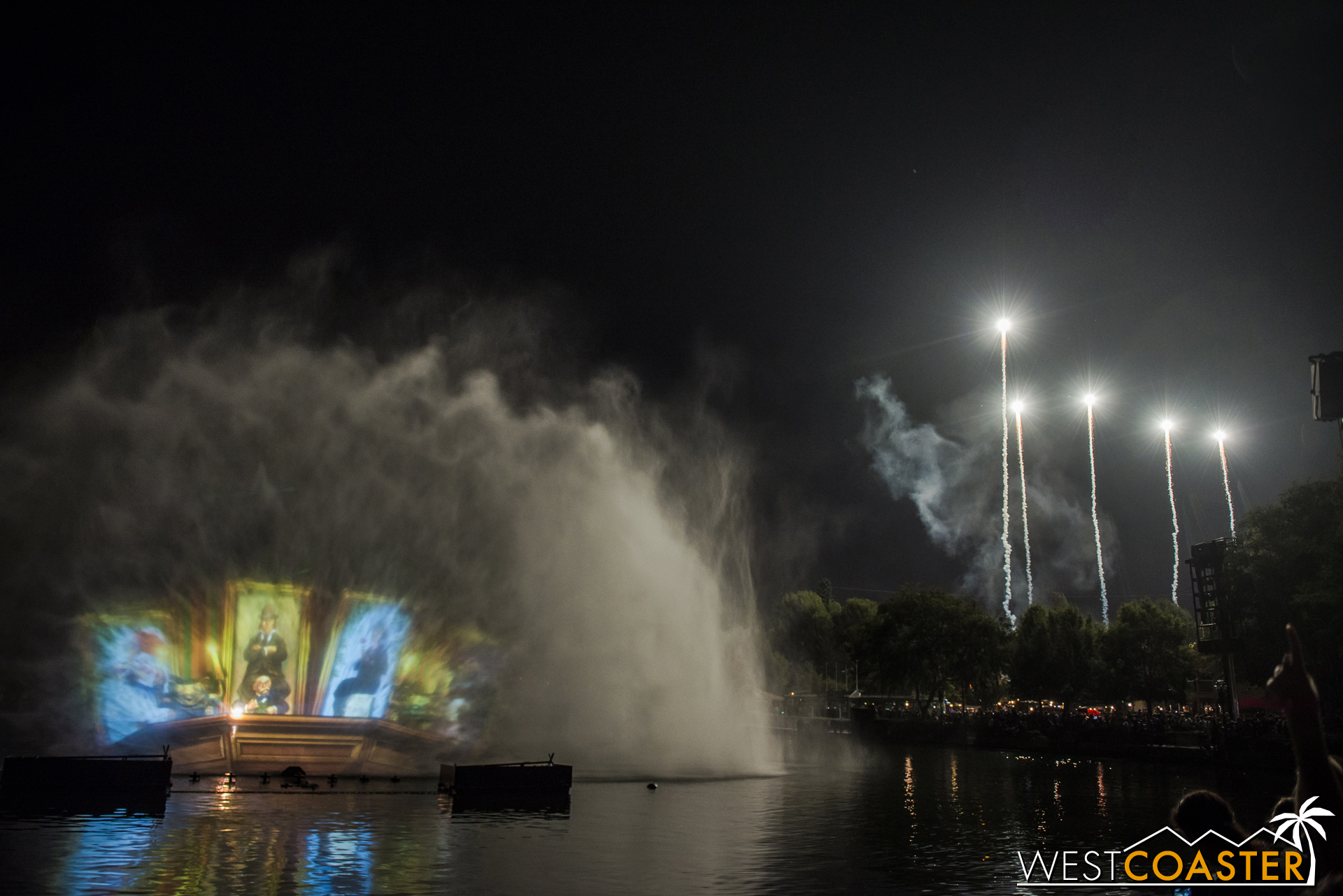  Spectral bursts light up the The Hub beyond during the Haunted Mansion segment of Remember... 