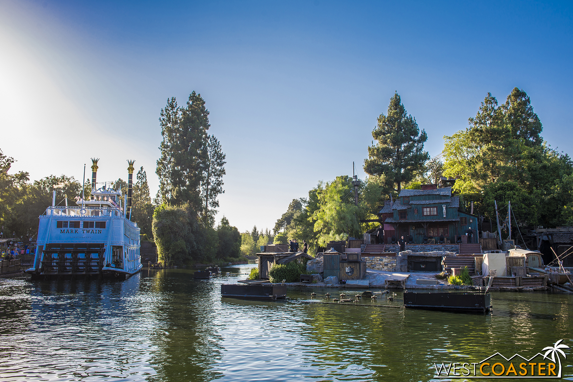  By early evening, setup for FANTASMIC can be seen all around the Rivers of America. 