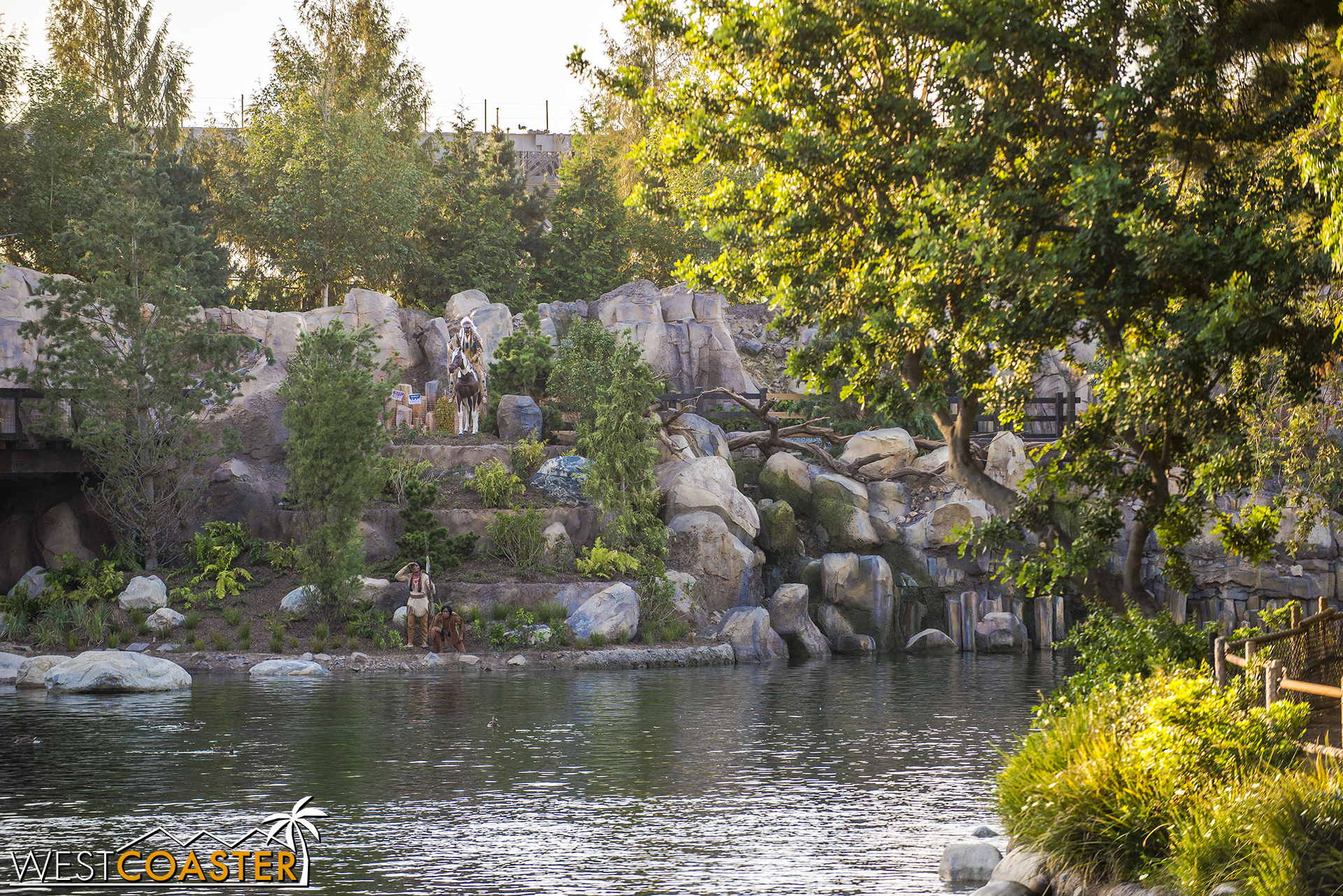  The Indian Chief and a couple of braves have settled along the river, looking out toward water traffic. 