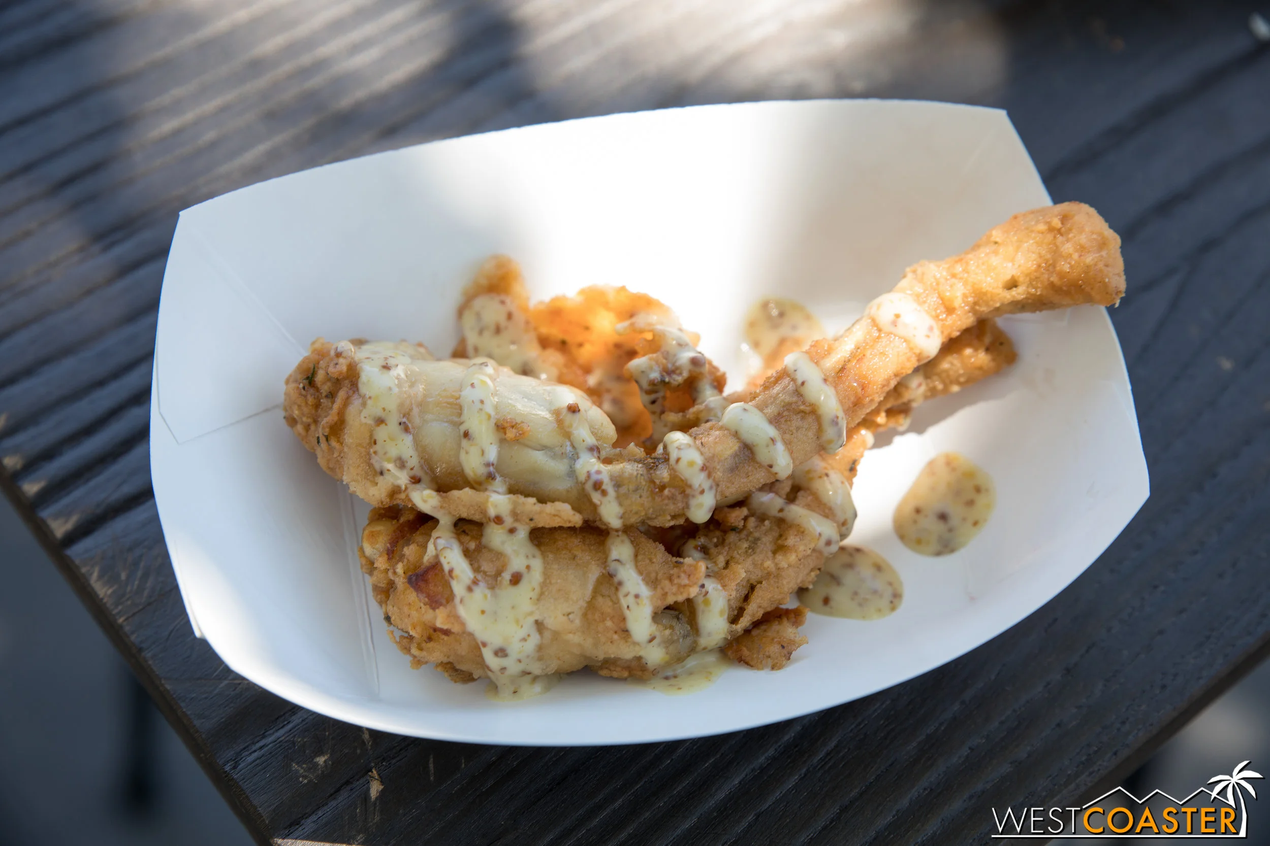 I'll be fair: This was not my favorite, but I tried it. Frog legs are...they have a flavor of fish, but texture of chicken. Like, it's got that salty fishy flavor but also chickeny texture and basically I cried for five minutes 'cause I ate Kermit. I mean, what else was supposed to happen to the frog after the puppeteer got fired? Too soon? Yea...too soon. 