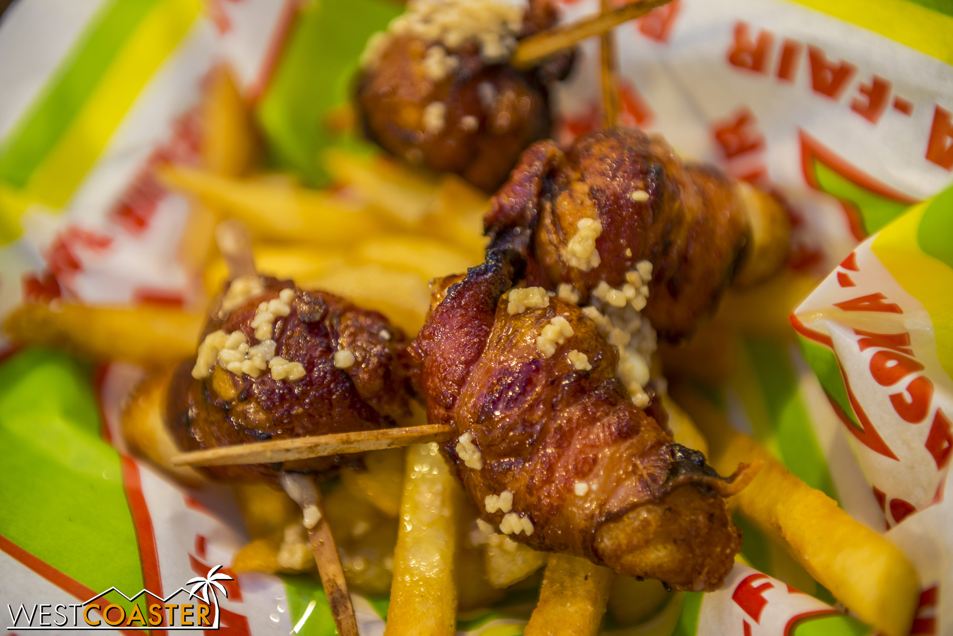  This bacon wrapped garlic cheese balls were honestly one of the most delicious fair foods I've ever had.&nbsp; The fries were bacon fat fried.&nbsp; At $9 for four pieces, it was pricey but not actually that bad compared to other items. 