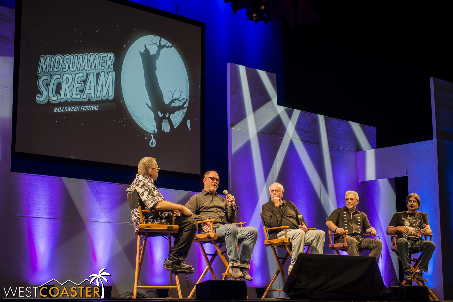 Rick West on the left, with the Imagineers in the middle, and Mark Silverman on the right.