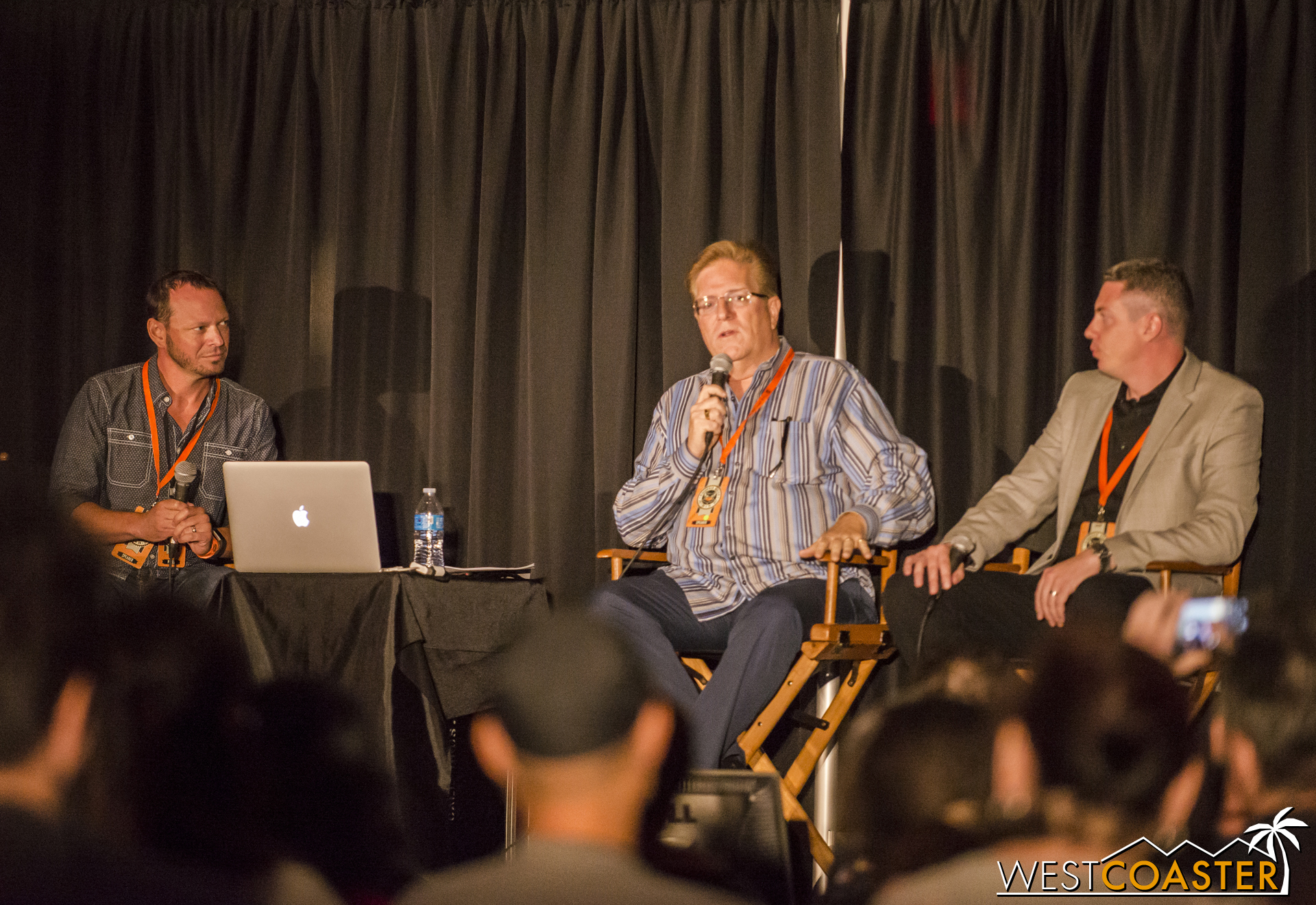 Tim O'Day (center) and Walter Magnuson discuss the updates that have come to the Winchester Mystery House over the past year.