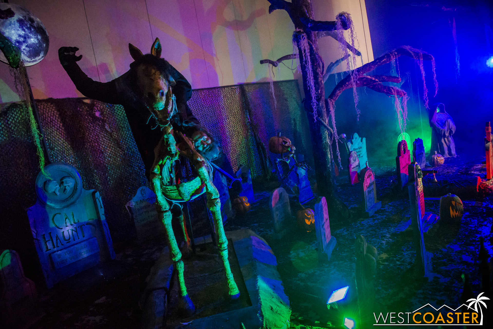  CalHaunts constructed an impressive graveyard scene of weathered tombstones, spooky animatronics, eerie fog, and sinister soundscape. 