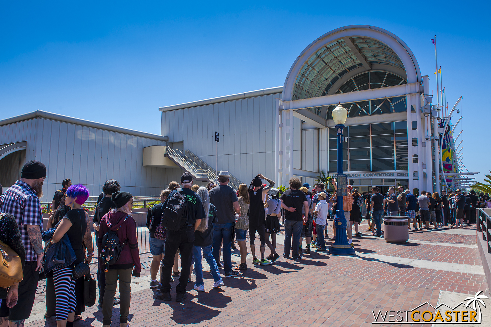  Long lines may have plagued morning entry on Saturday, but they didn't seem to dampen the spirits of guests. 