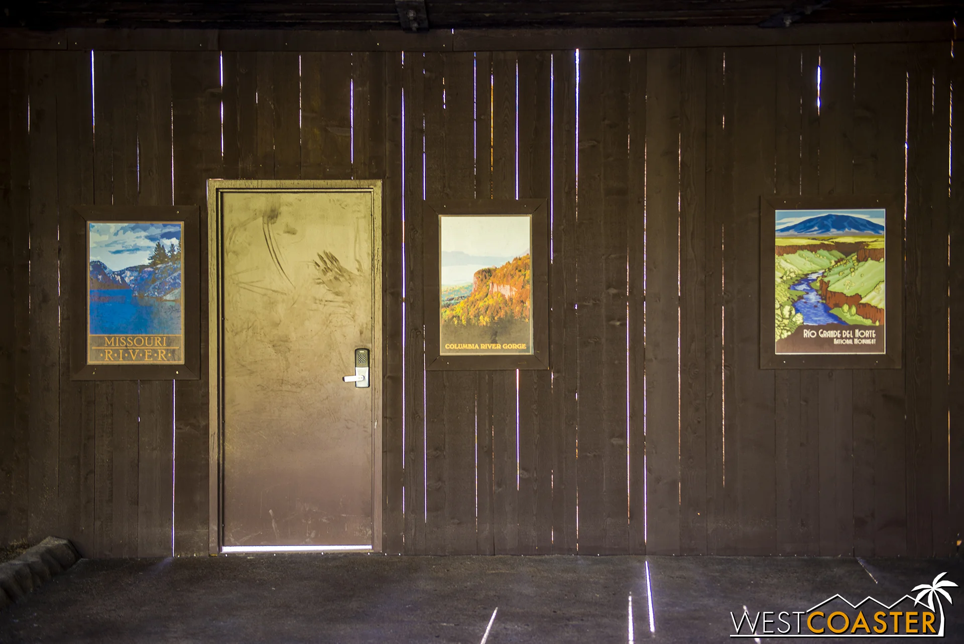 The work walls showcase the new waterfalls that are part of the Disneyland Railroad passage along the Rivers of America.