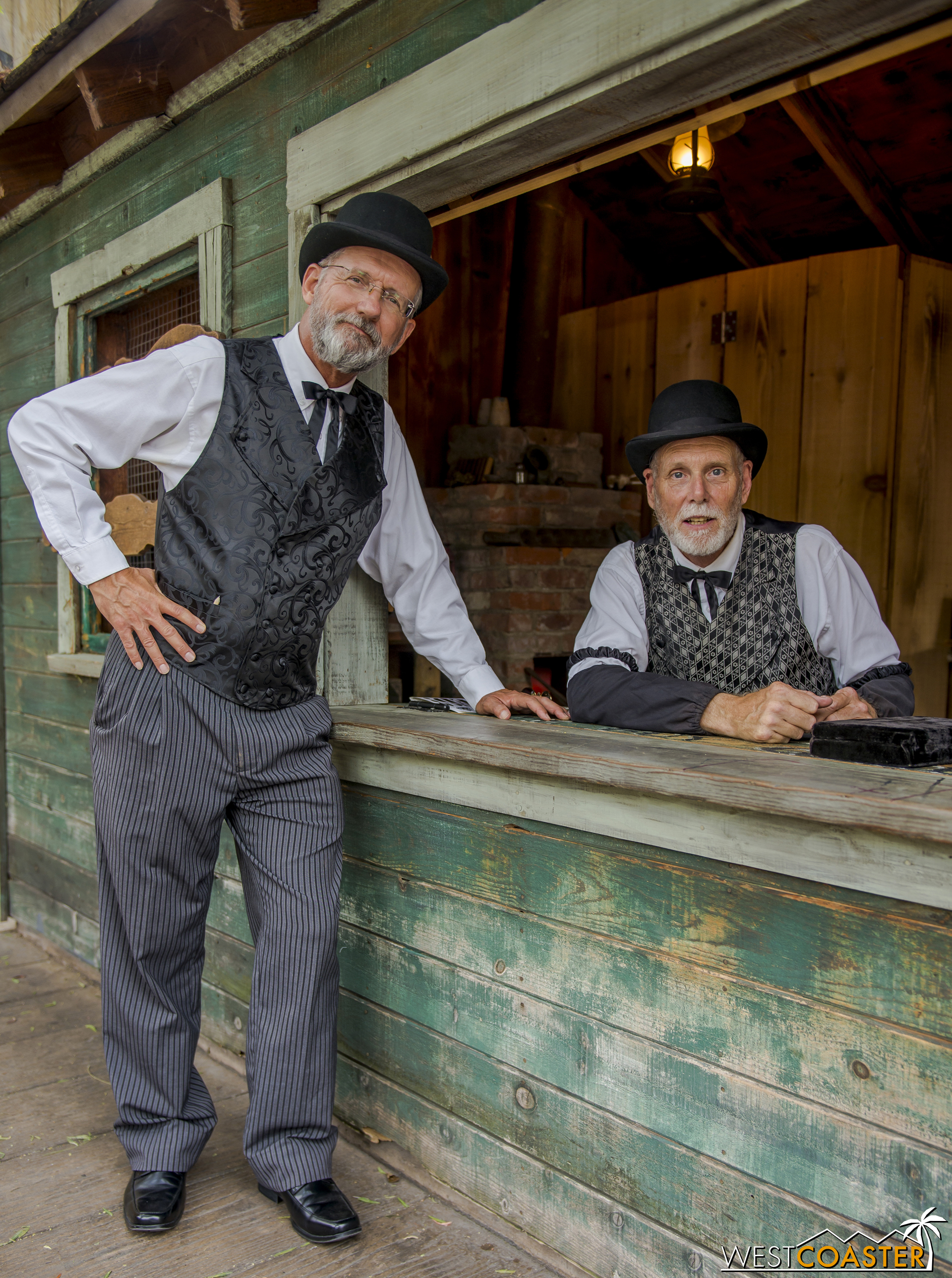  Augustus French (left), the town assayer, stands next to his almost-doppelganger. 