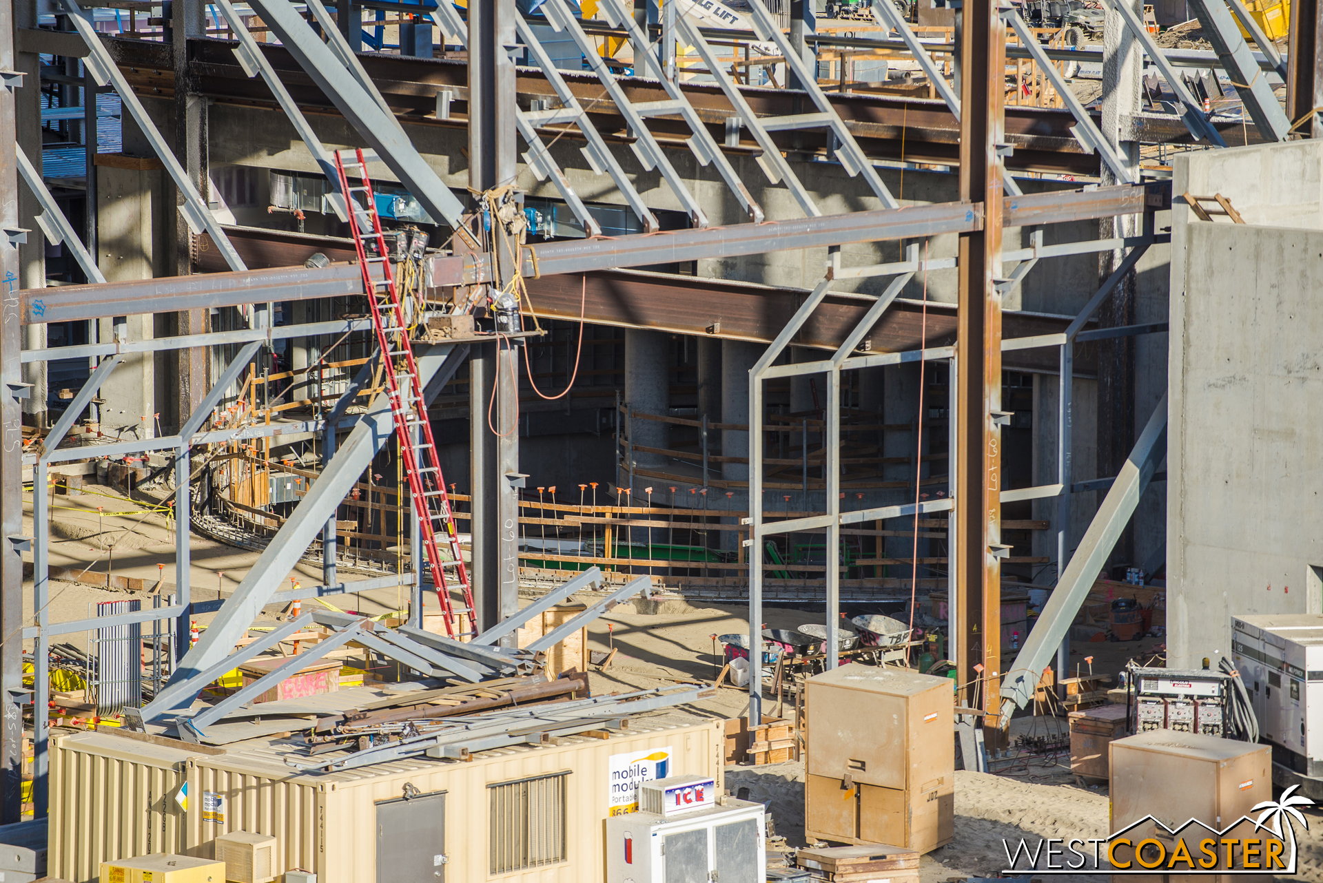  Steel is being assembled to be installed within the space. &nbsp;And deeper in, they're forming a wall to enclose what we used to call a pit and could also be a loading zone for the ride (or something circular). 