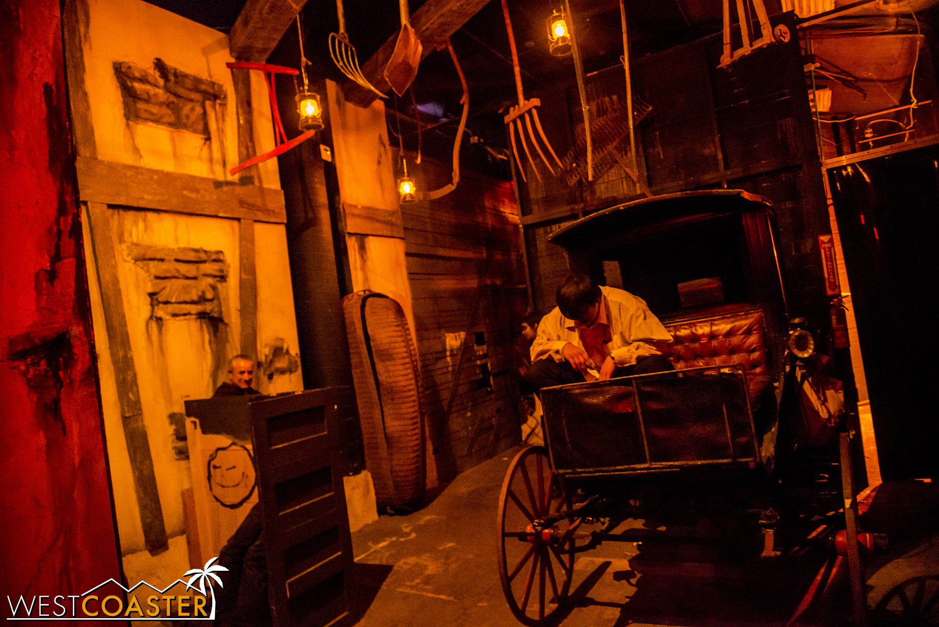  Near the end of the maze, guests pass by the Willoughby carriage. 