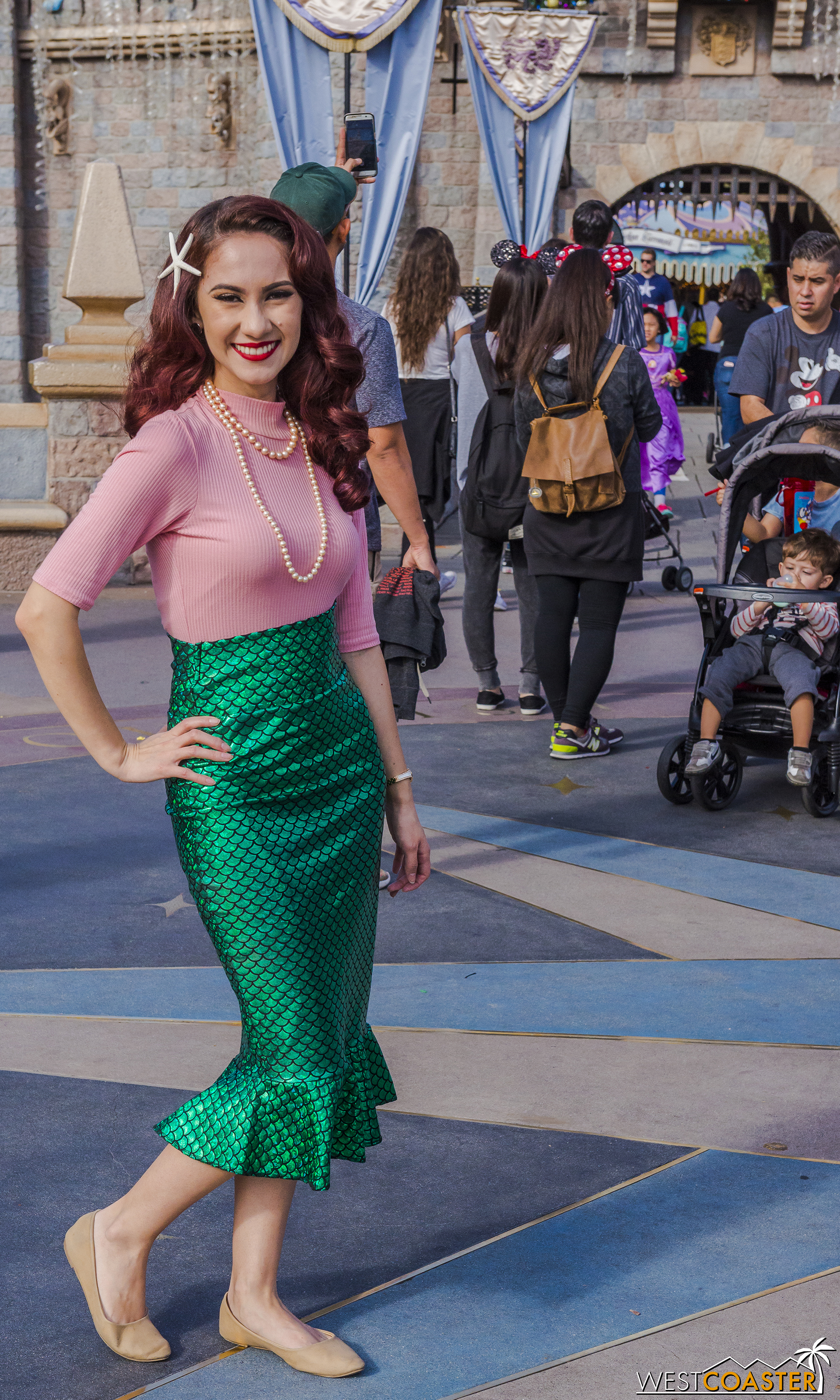  A stylish Ariel, complete with mermaid pencil skirt. 