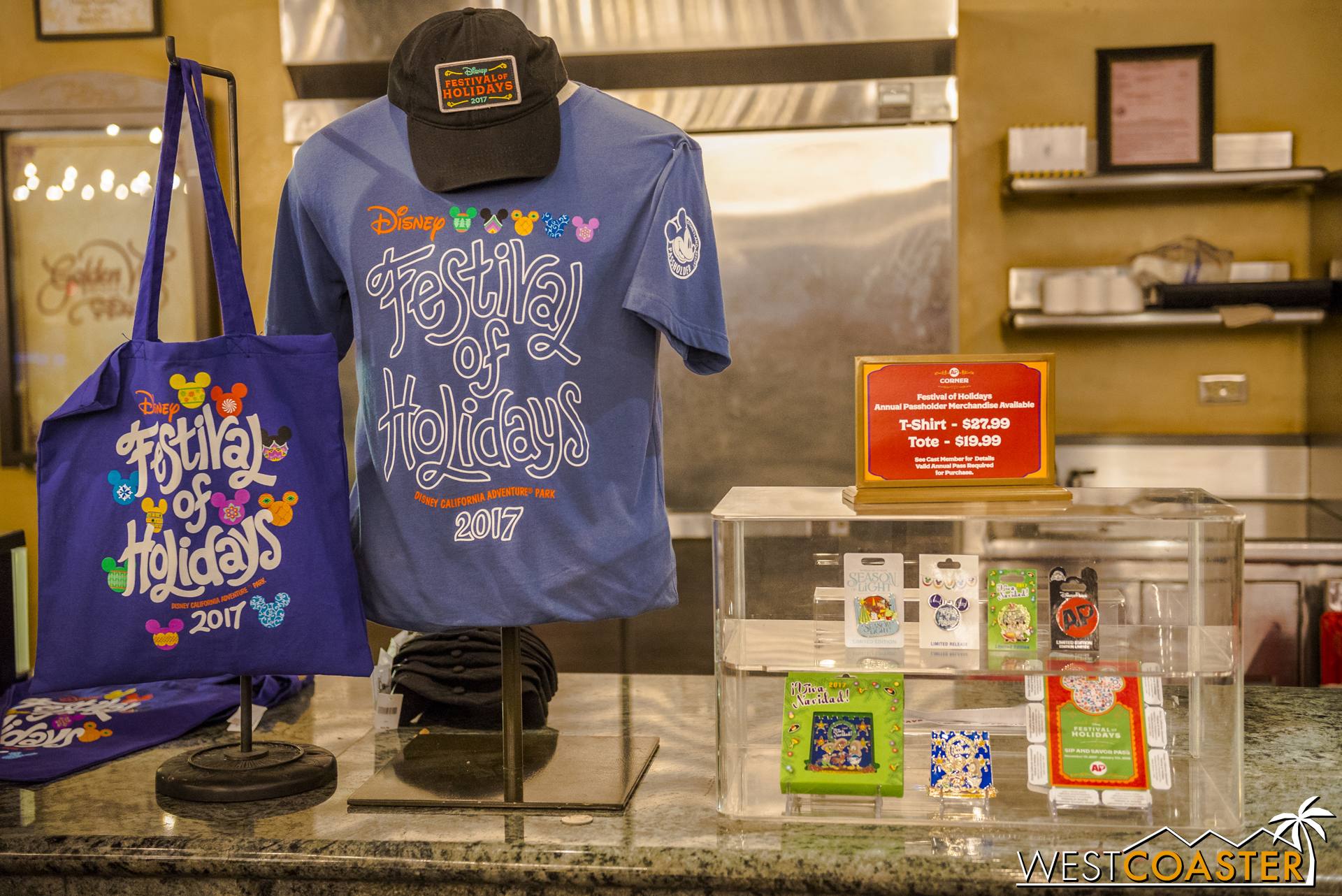  Annual passholders have exclusive merchandise, such as this shirt, bag, or cap, or these pins. 