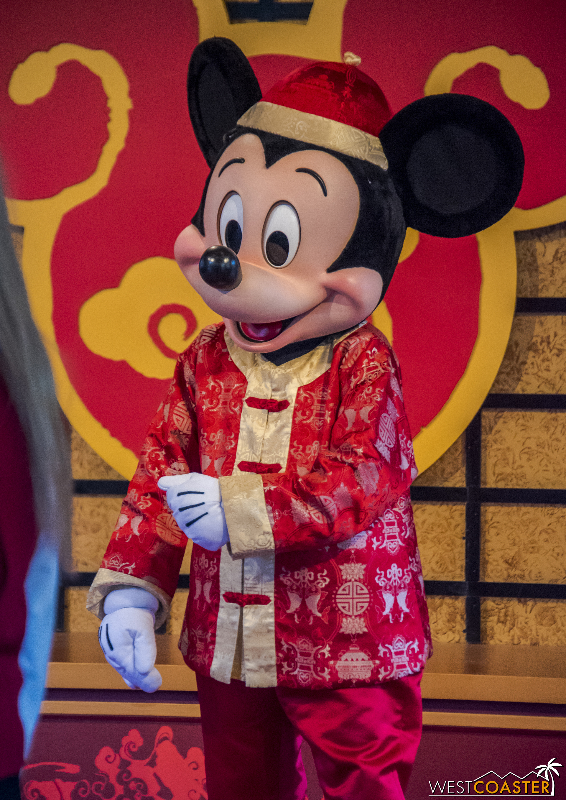  Mickey looks pretty dapper in his traditional Chinese garb. 