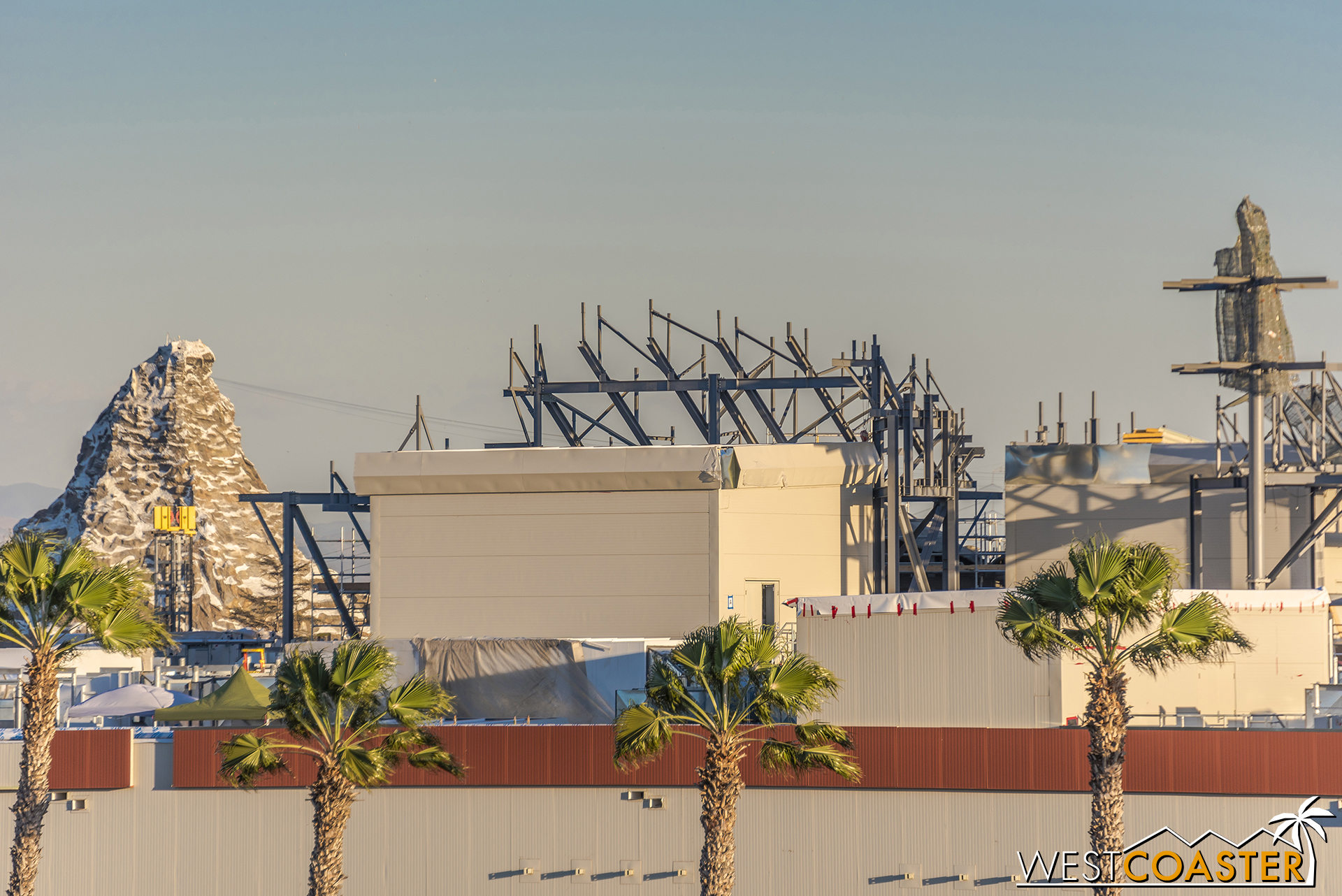 We're starting to see framing for rocks reaching up and over to obscure the penthouses from park view.
