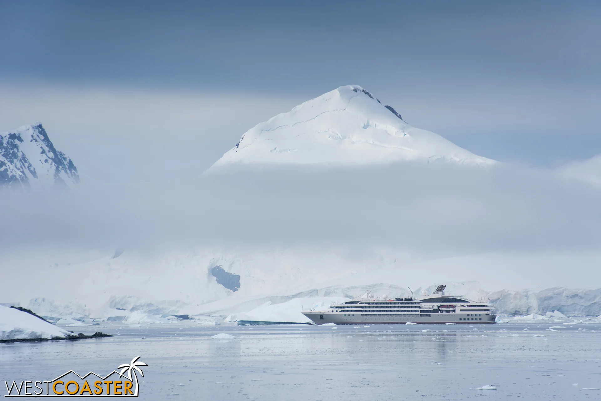 A distant ship from another Antarctic cruise operator waits for us to leave at a far end of the harbor.