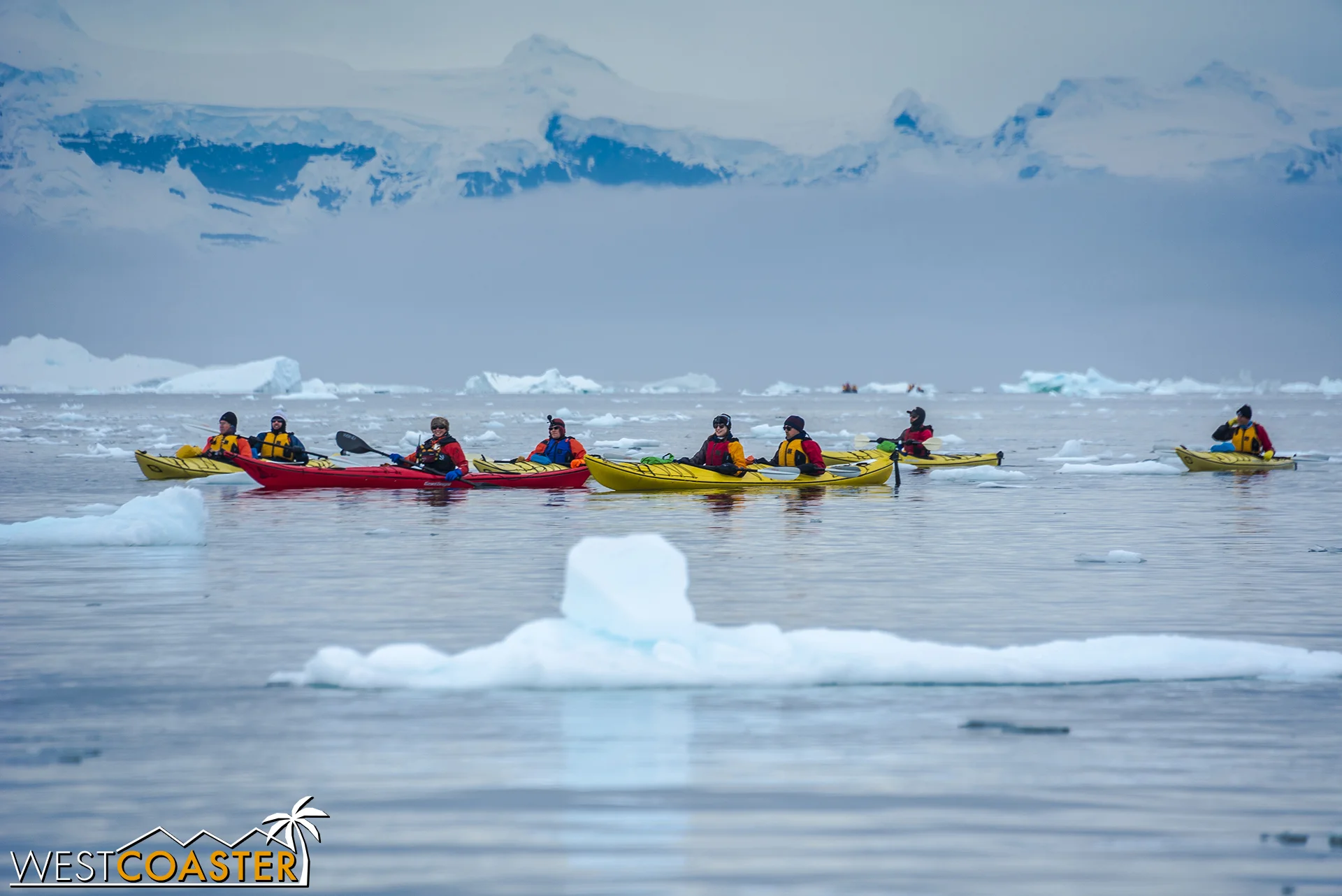 Kayakers approach in a group.