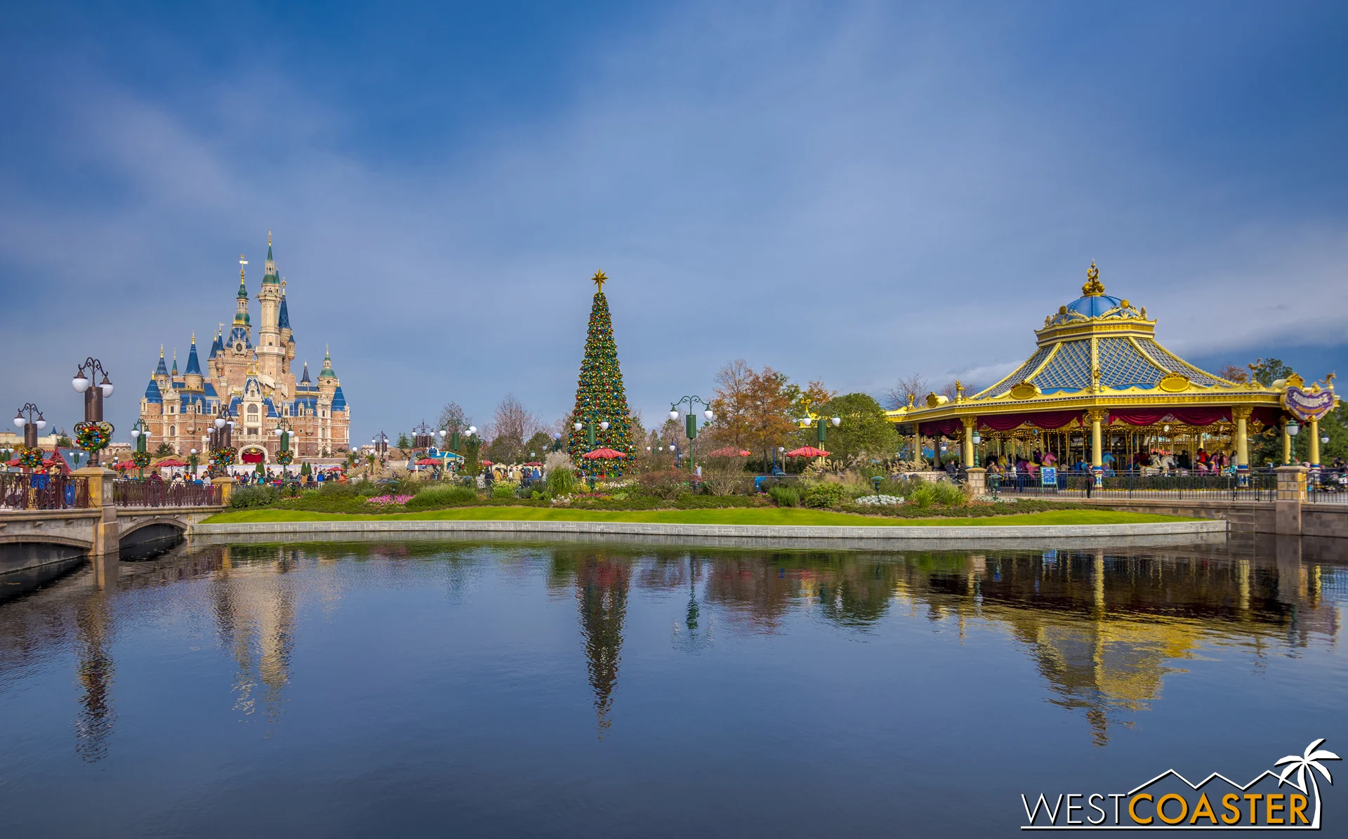 Left to right, the Enchanted Storybook Castle, a towering Christmas tree, and the Fantasia Carousel mark a skyline of sorts in the Gardens of Imagination.