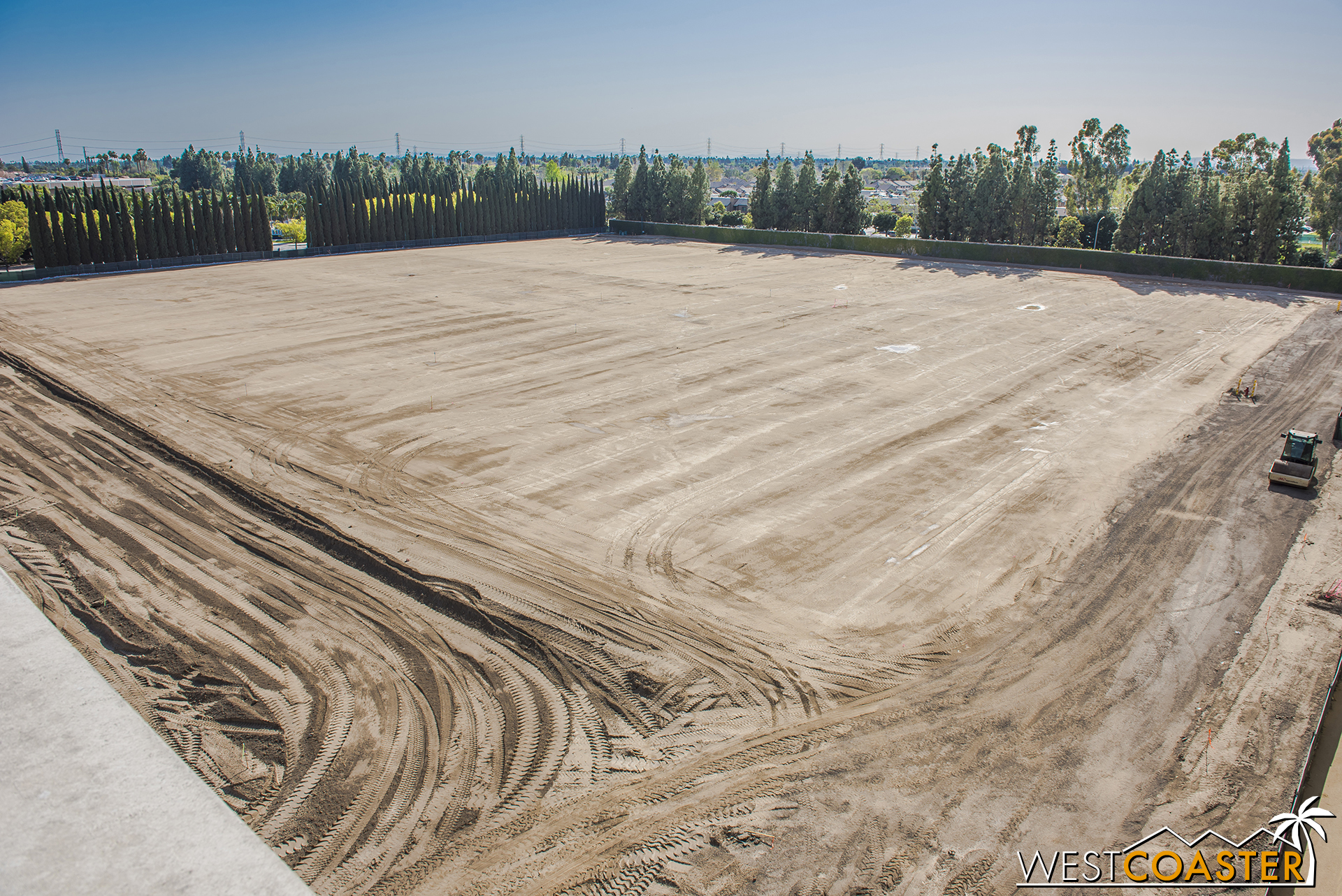  Meanwhile, the site on the west half has been graded so flatly that it almost looks like they just sprinkled dirt over the existing parking lot asphalt. 