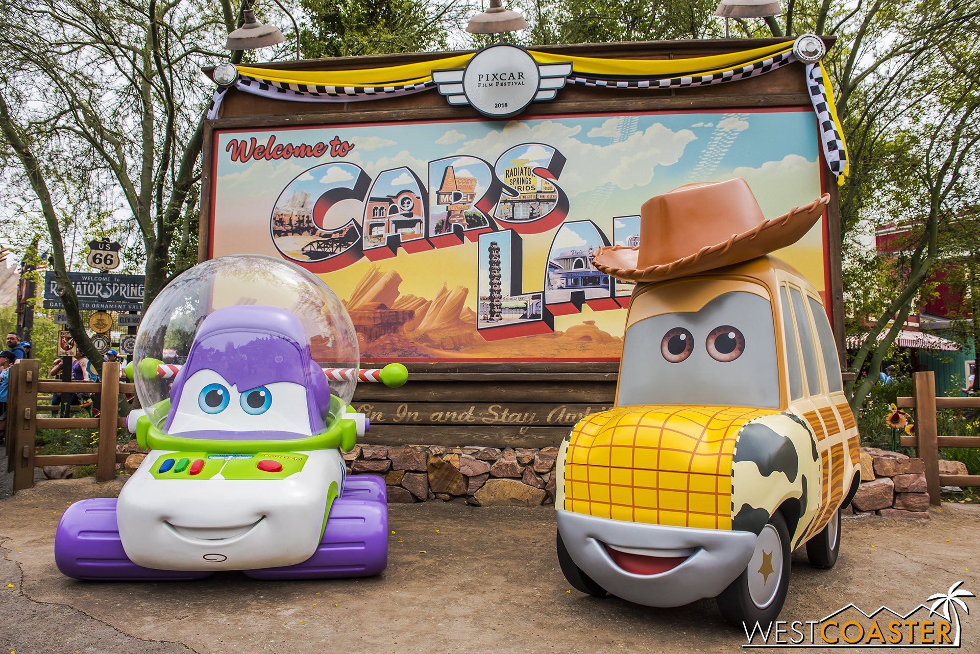  There are some new but familiar vehicles over at by the “Welcome to Cars Land” sign. 