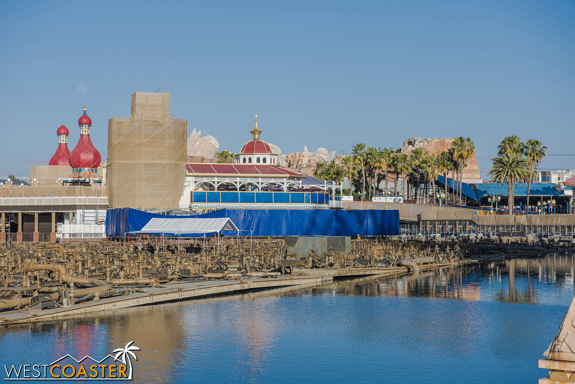 Lamplight Lounge remains covered behind tarps for repainting.