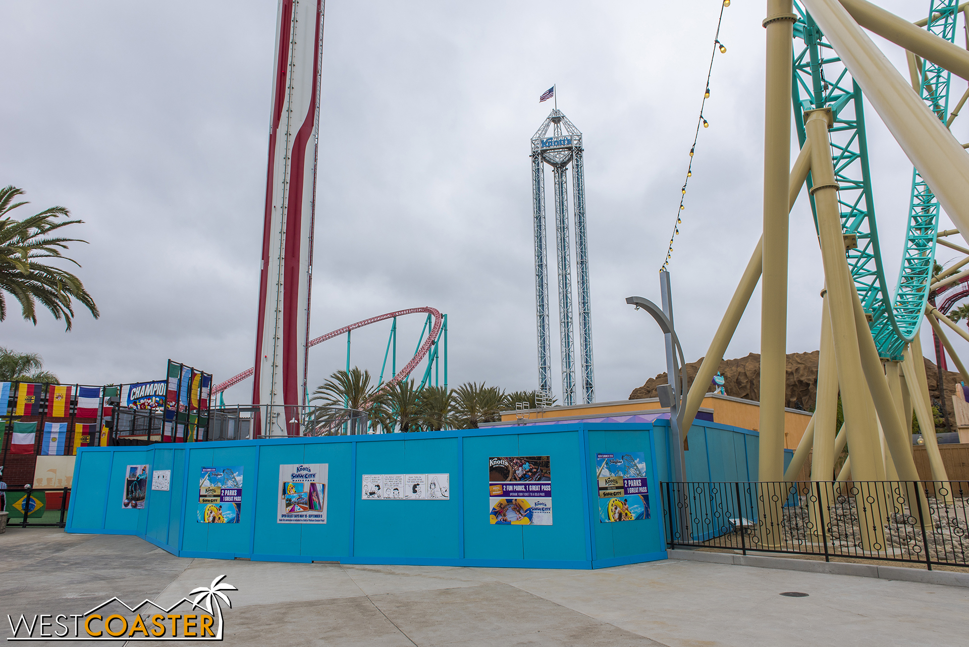 A little bit of the HangTime construction footprint remains behind work walls, as the park constructs a new footing and pad for the very slightly relocated Wipeout ride, next to the Sky Cabin. 