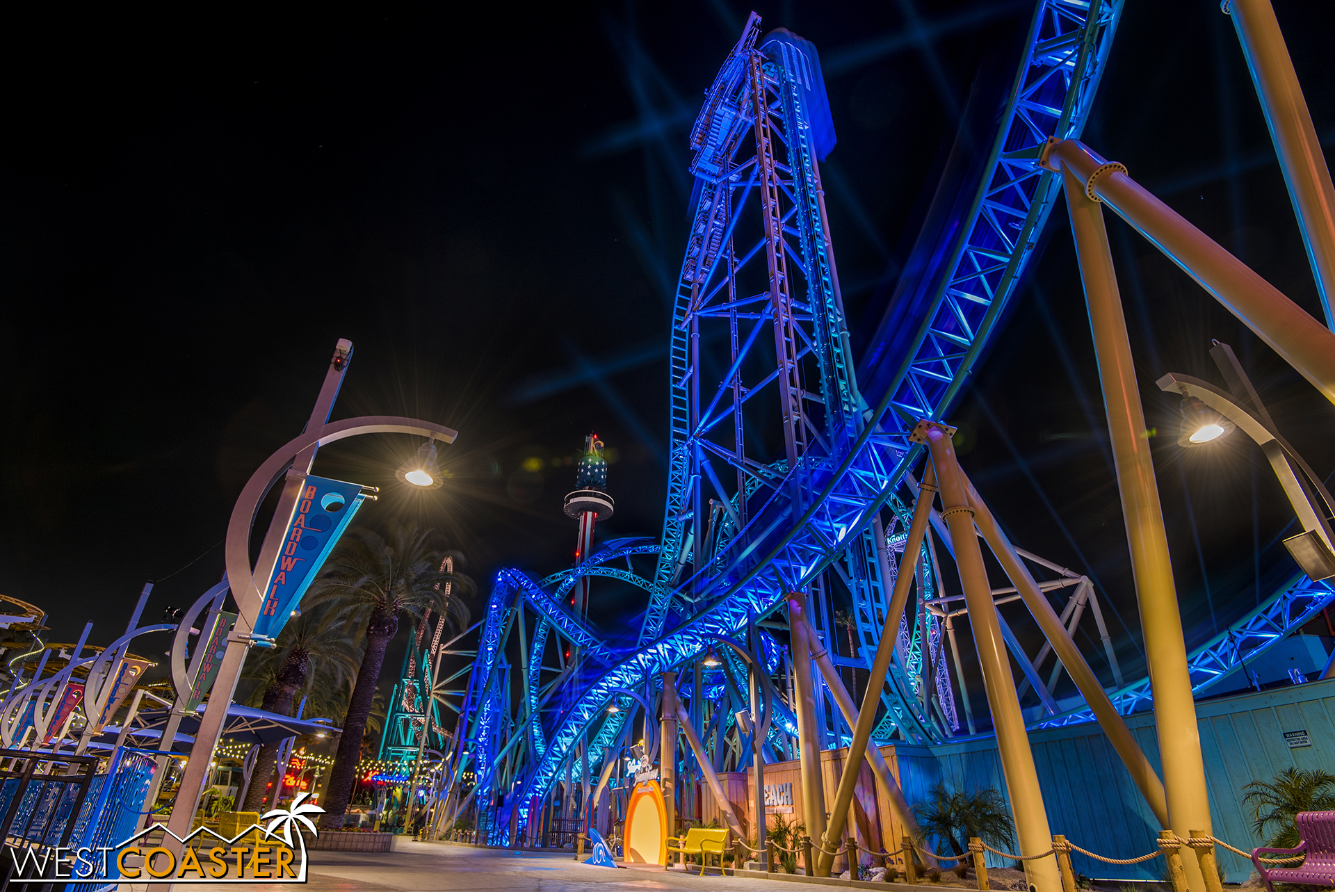  Compositing several exposures together to capture the coaster train blurring through the course. 