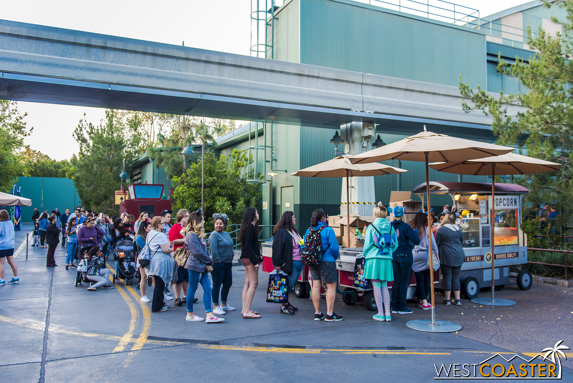  If you were like these folks last Friday, you were waiting to get a souvenir popcorn bucket. 